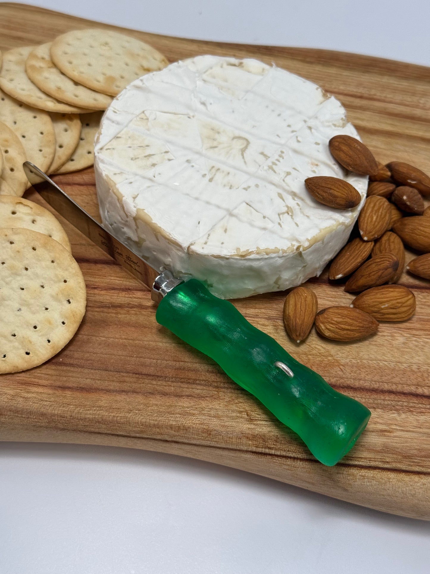 Cheese knife - Jade Green resin - irregular shaped handle with silver staple insert