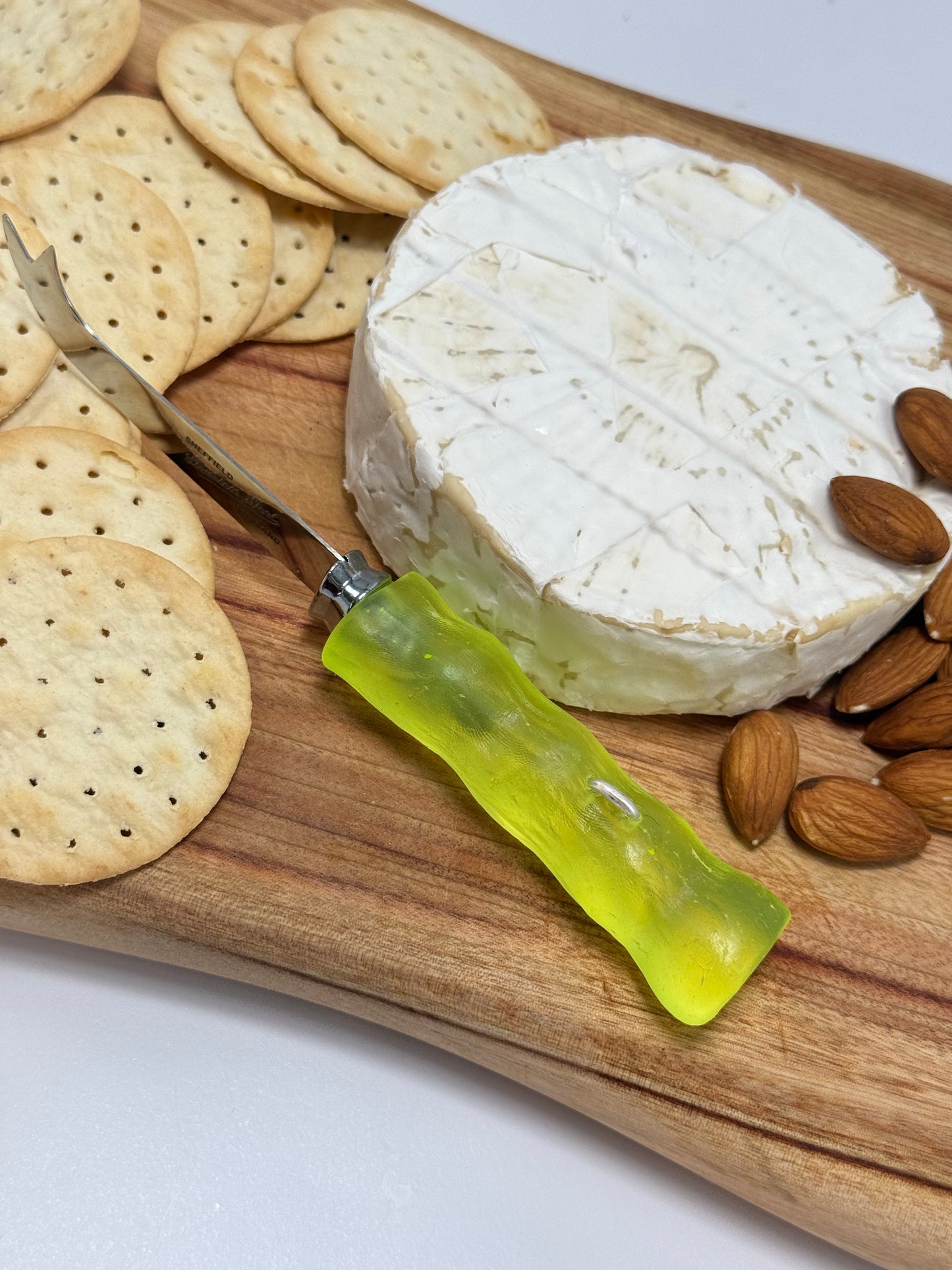 Cheese knife - Neon Yellow resin - irregular shaped handle with silver staple insert