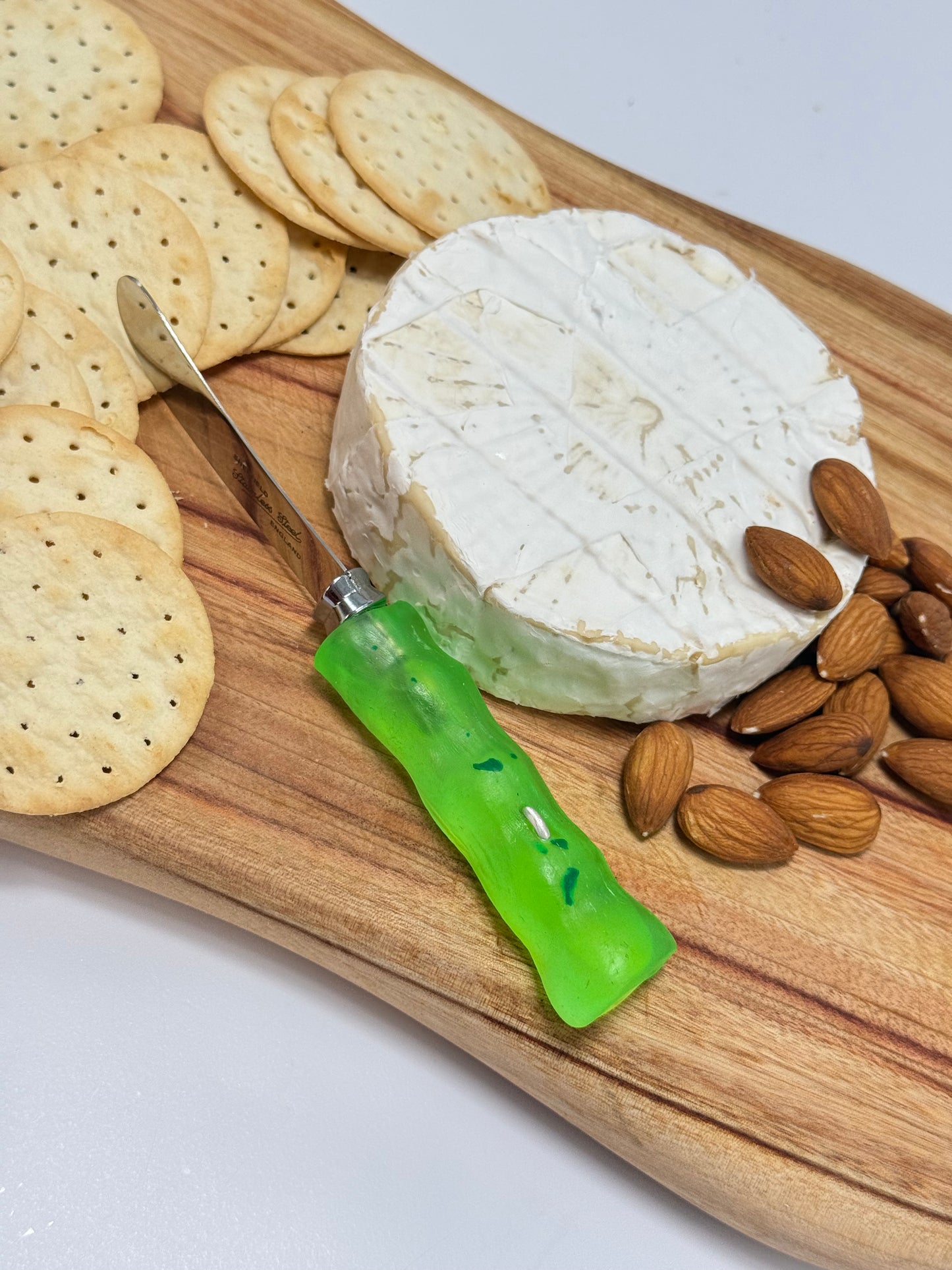 Cheese knife - Neon Green resin - irregular shaped handle with silver staple insert