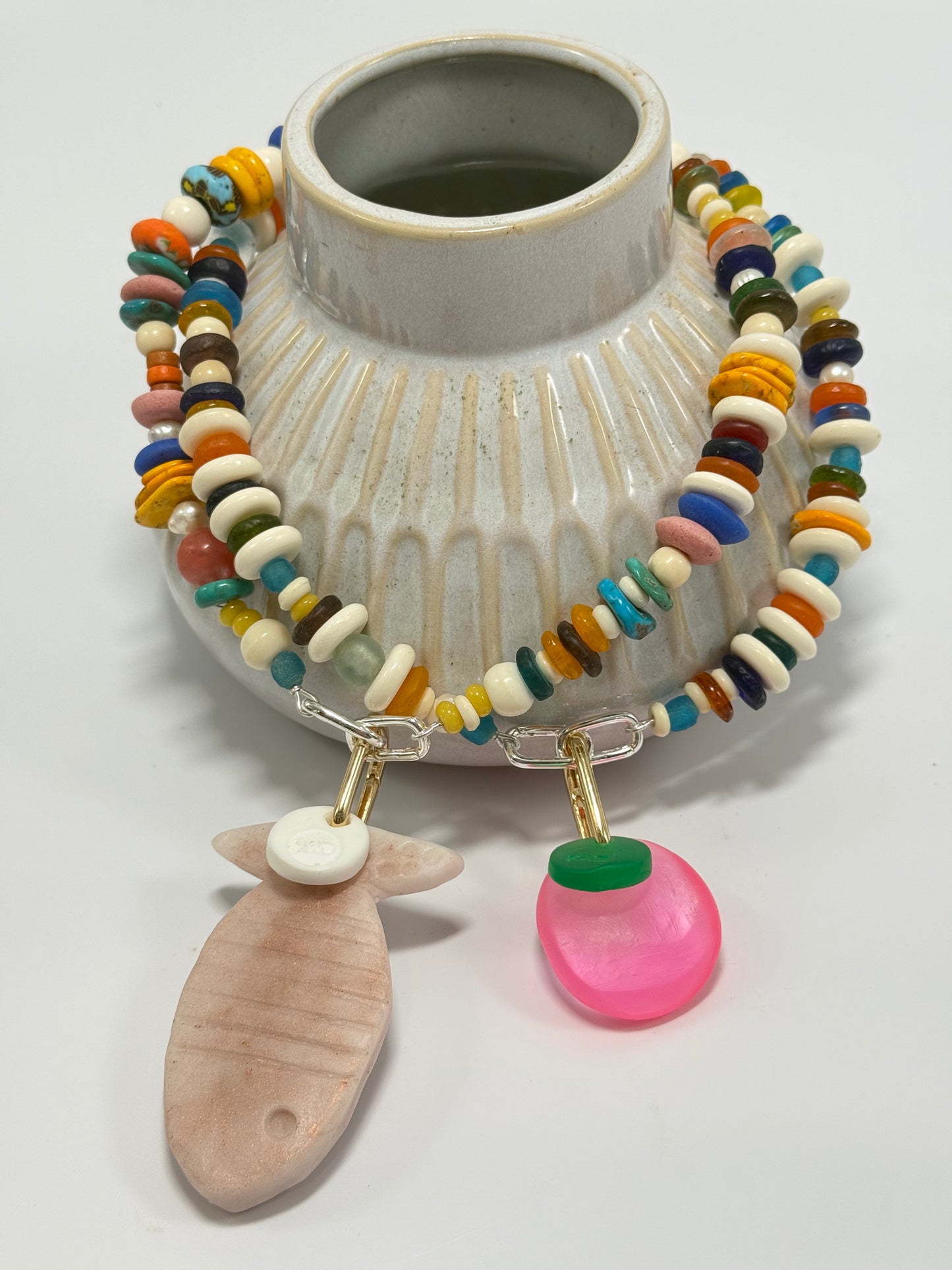 Cream/gold Fish & KWD button resin & gold catch pendant