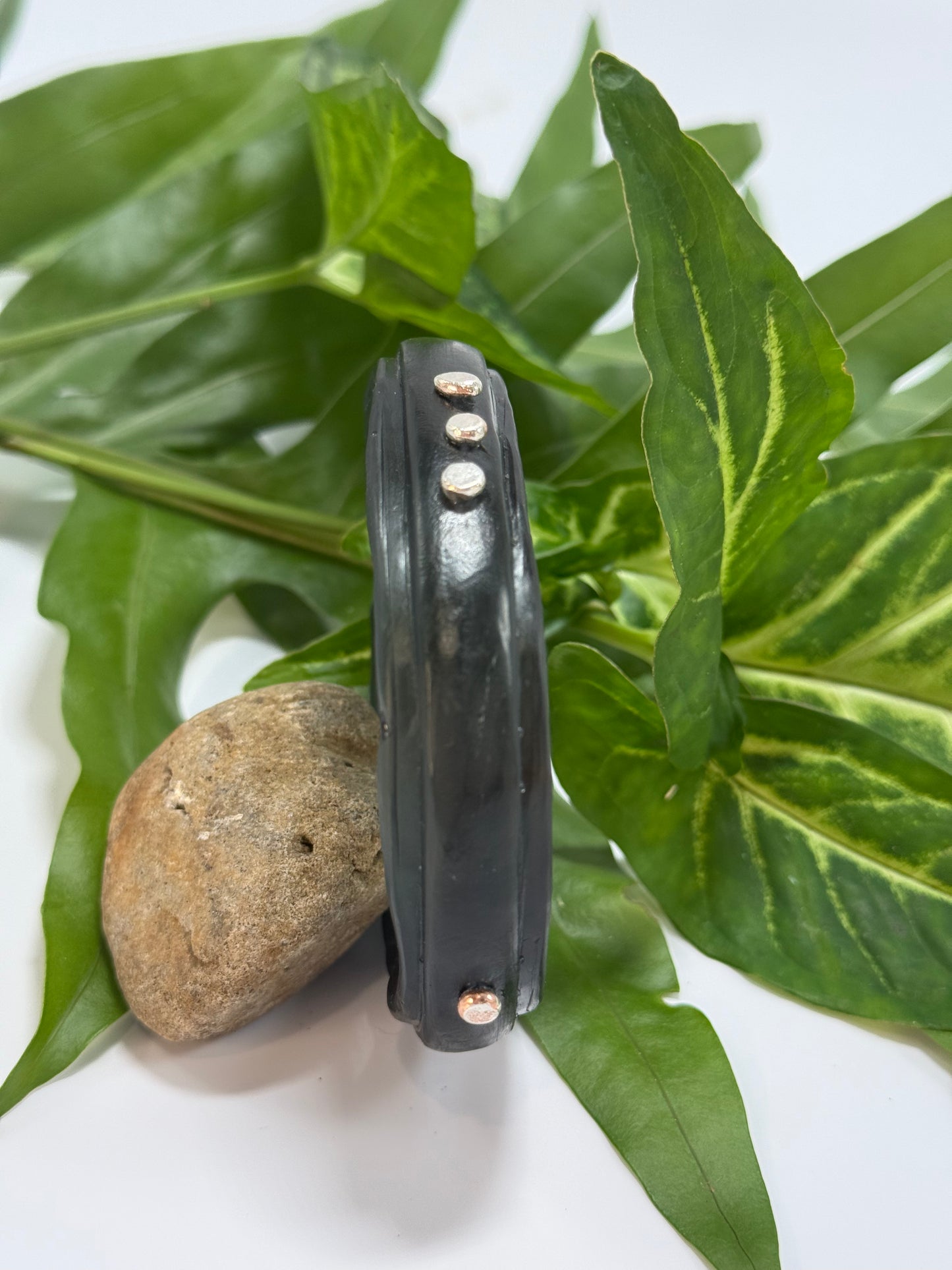 Translucent black coloured resin rim bangle with sterling silver rivets