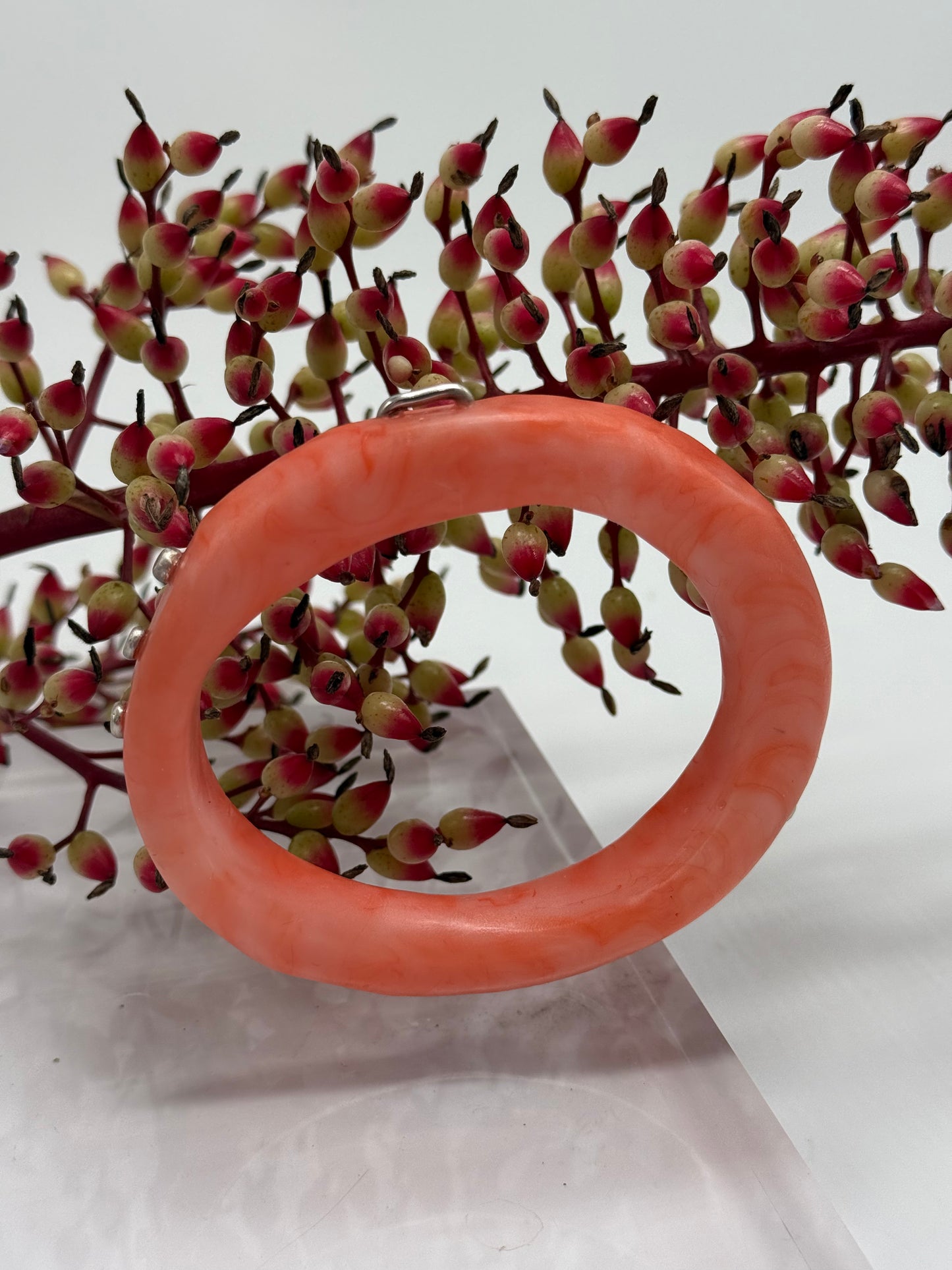 Orange/apricot swirl resin with silver rivets 'woopy' bangle