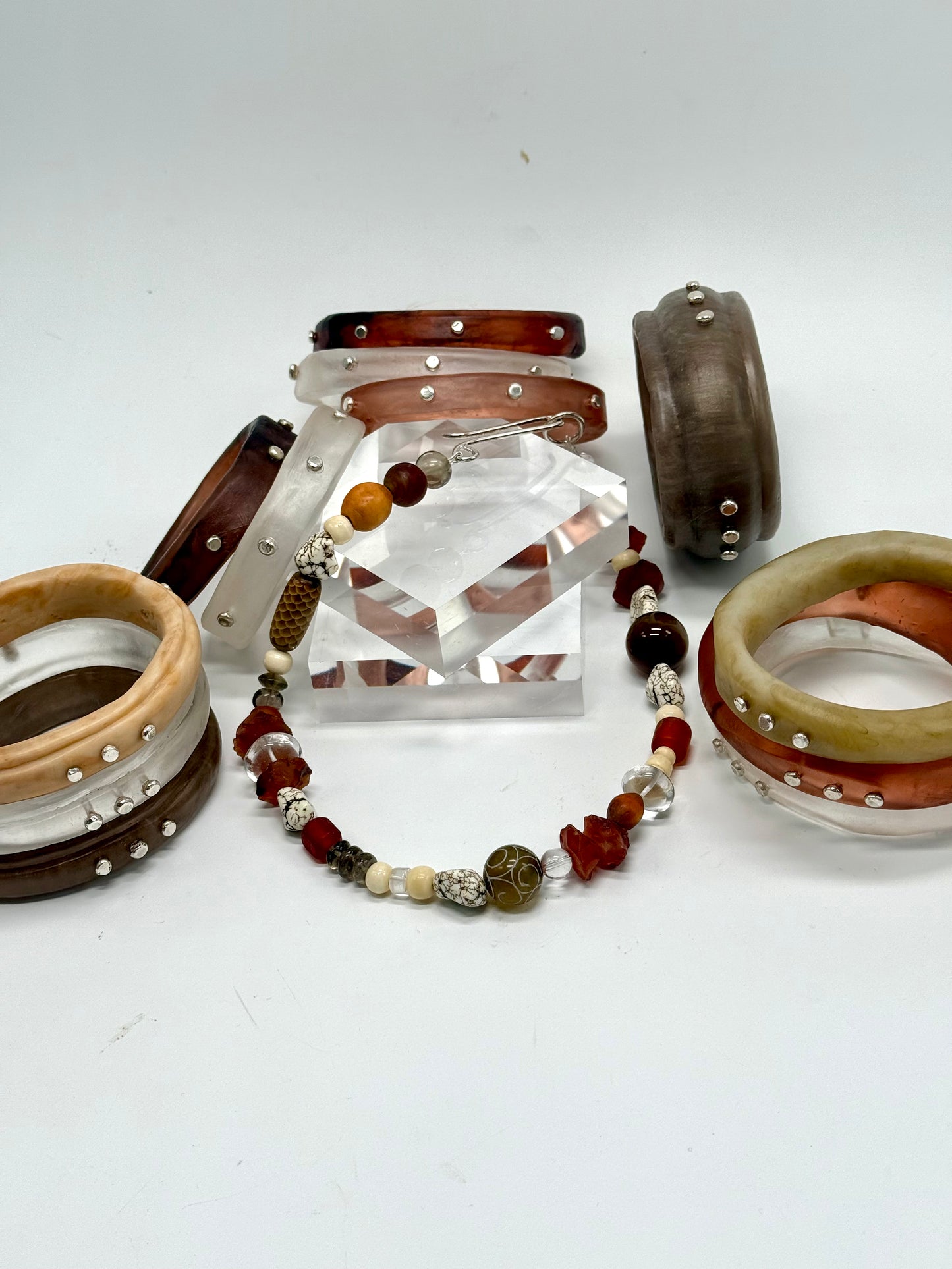 Neutral/brown coloured semi precious stones with Sterling silver catch