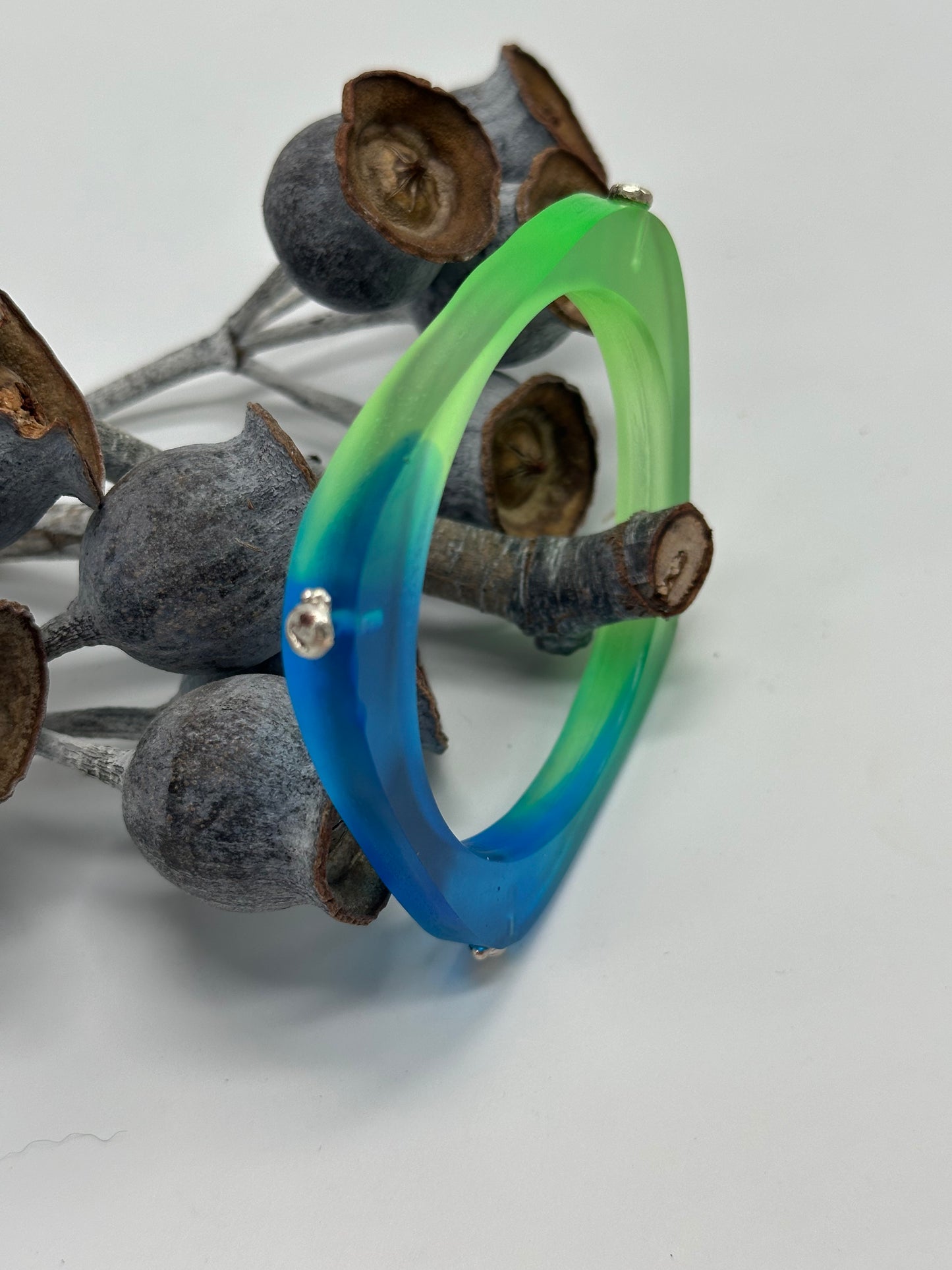 Two toned 'square round' blue/green bangle with silver