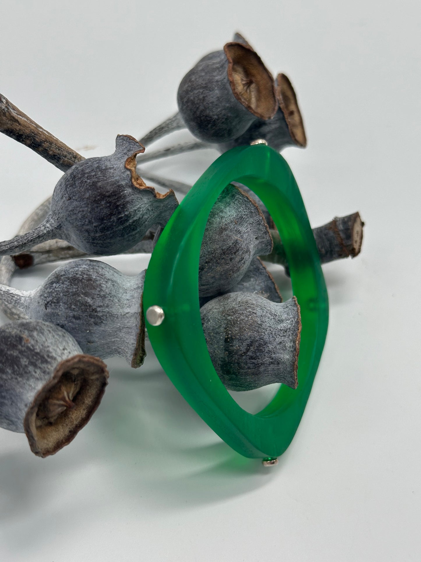Green 'square round' bangle with silver