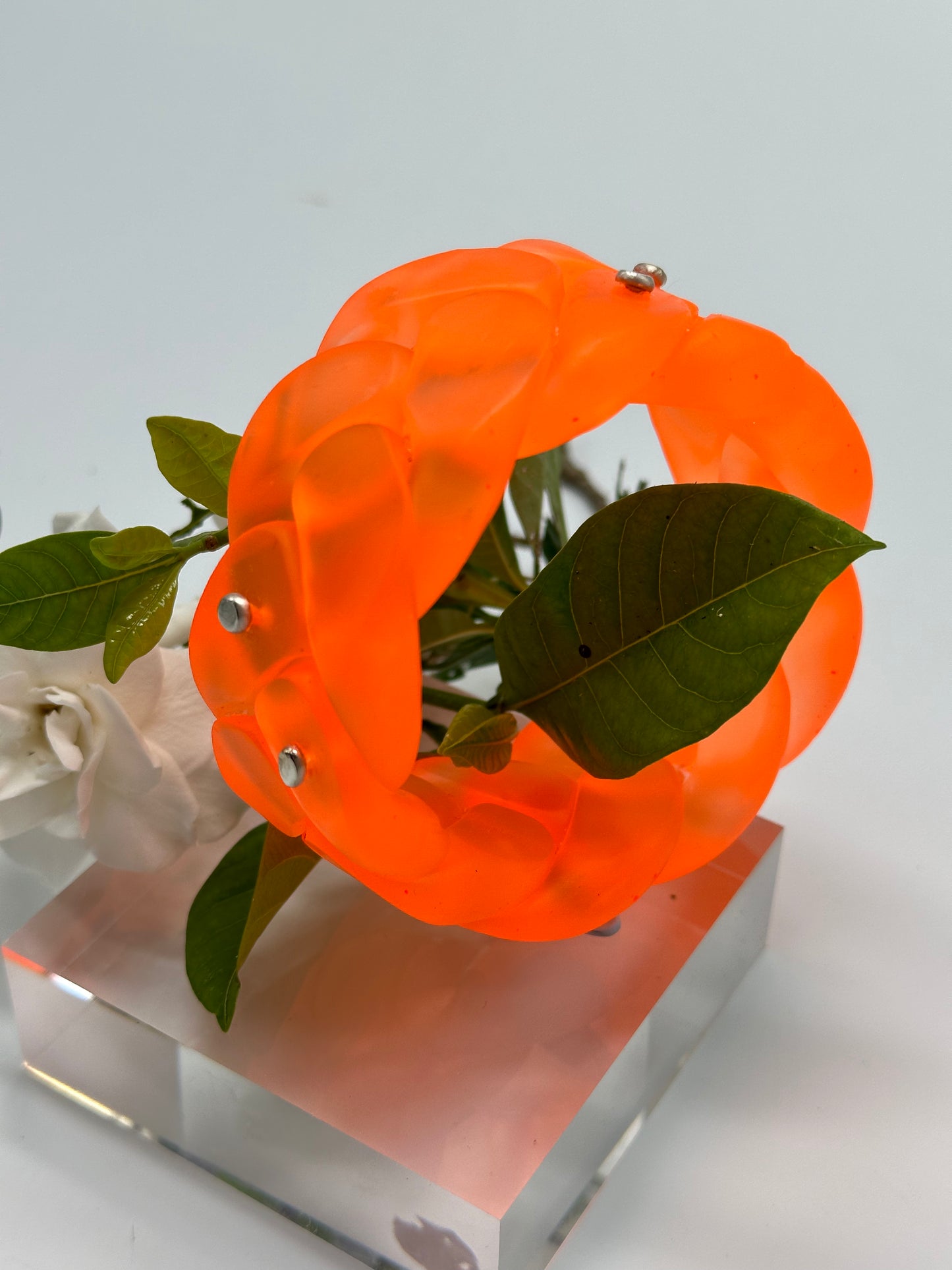 Neon Orange coloured Plaited Resin and silver bangle