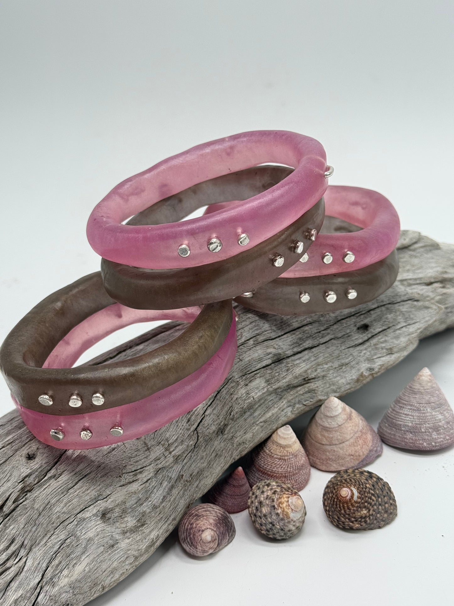 Pink resin and silver 'woopy' bangle - regular size