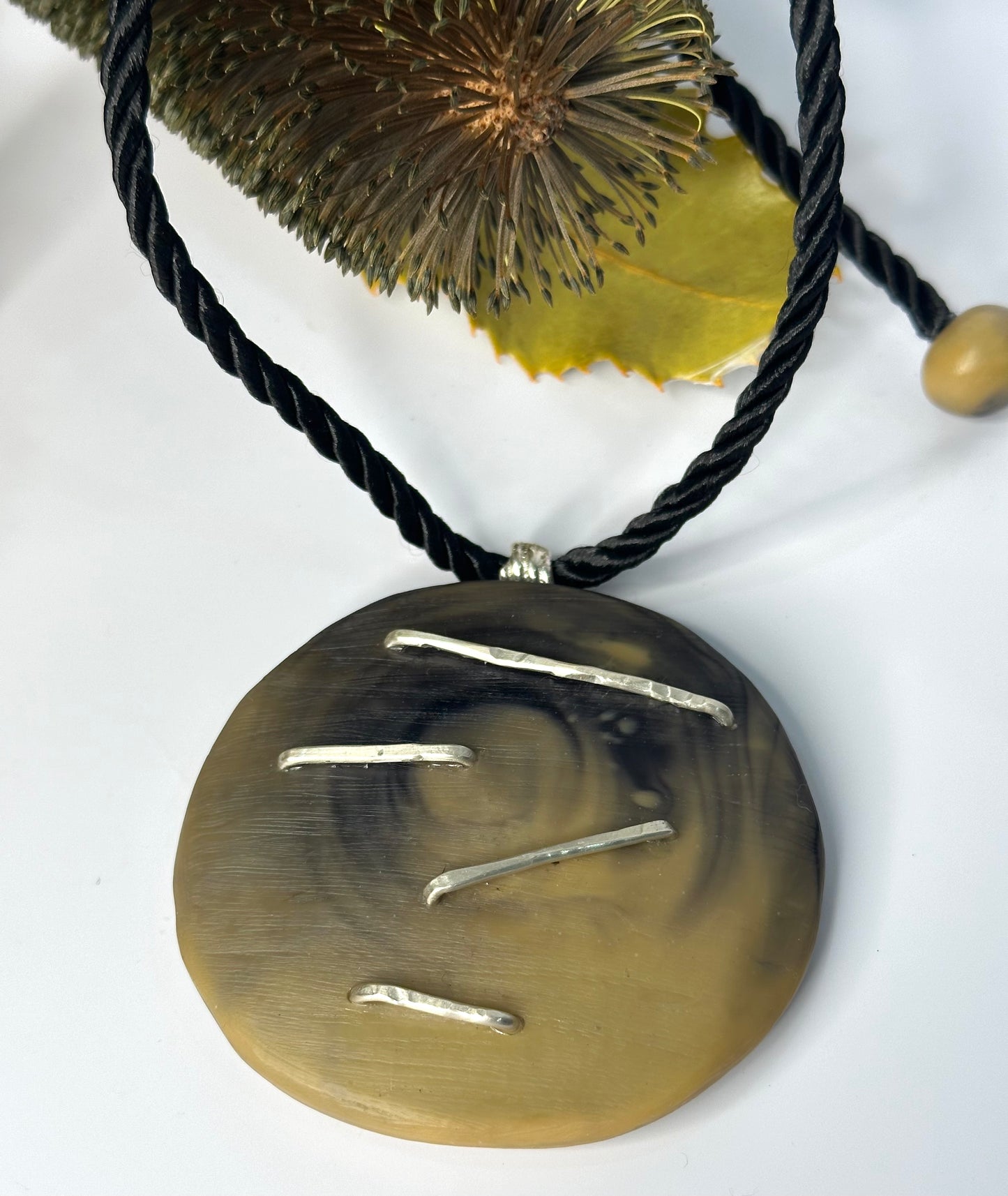 Tan/Black Round Pendant & silver necklace