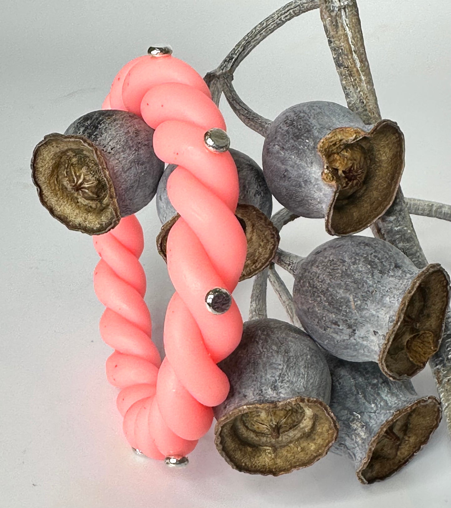 Neon Coral twisted resin & silver bangle