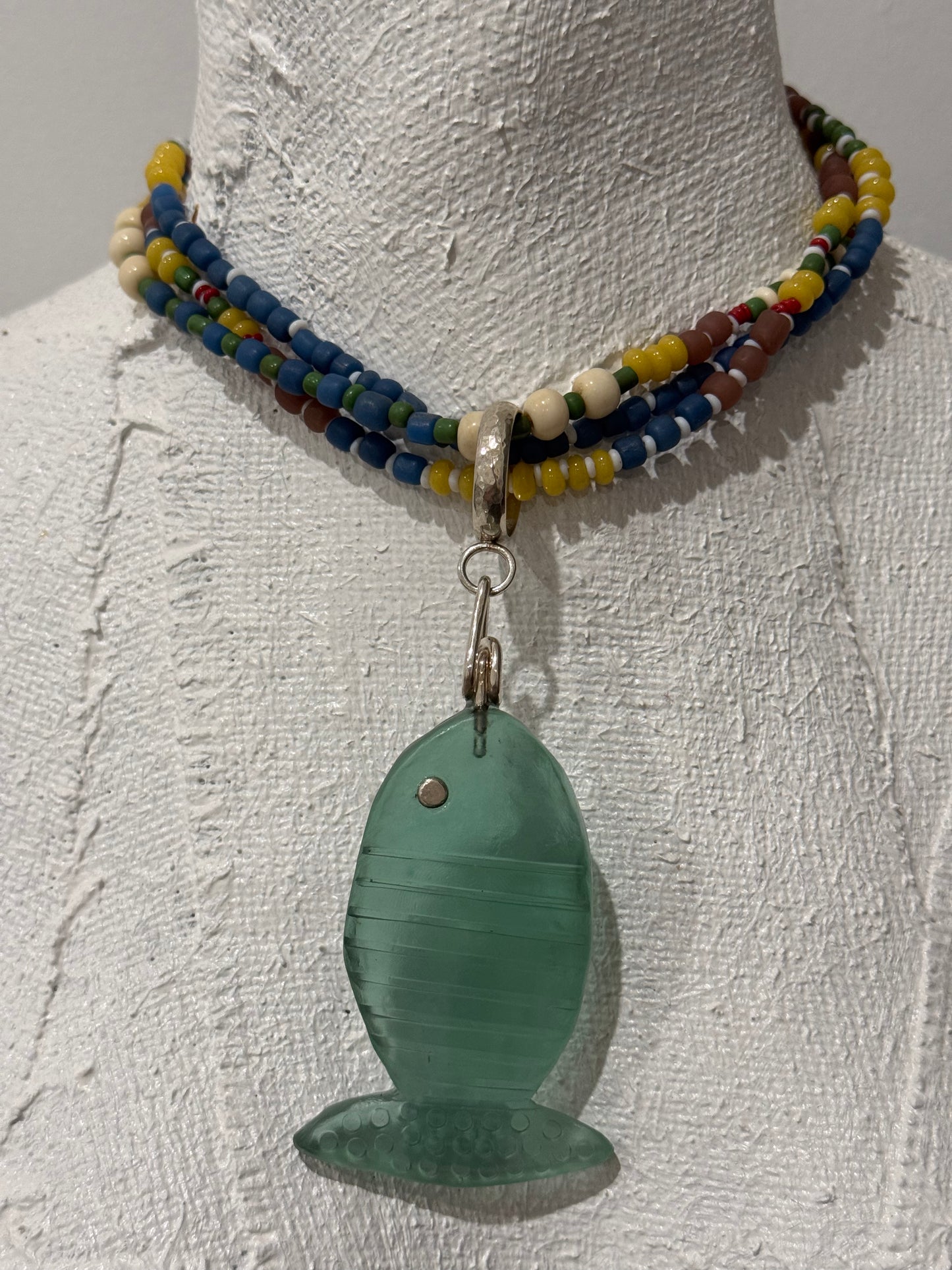 Multi coloured/multi strand with beaten sterling silver circle that can have any pendant added