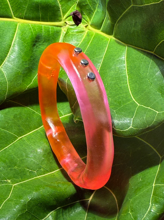 Neon Pink/Orange Rim resin bangle with Sterling silver