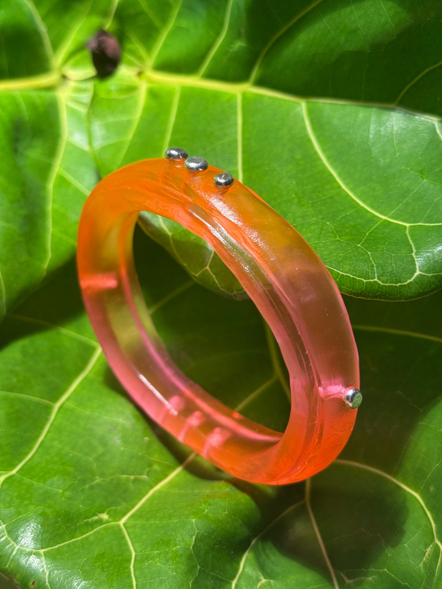 Neon Pink/Orange Rim resin bangle with Sterling silver