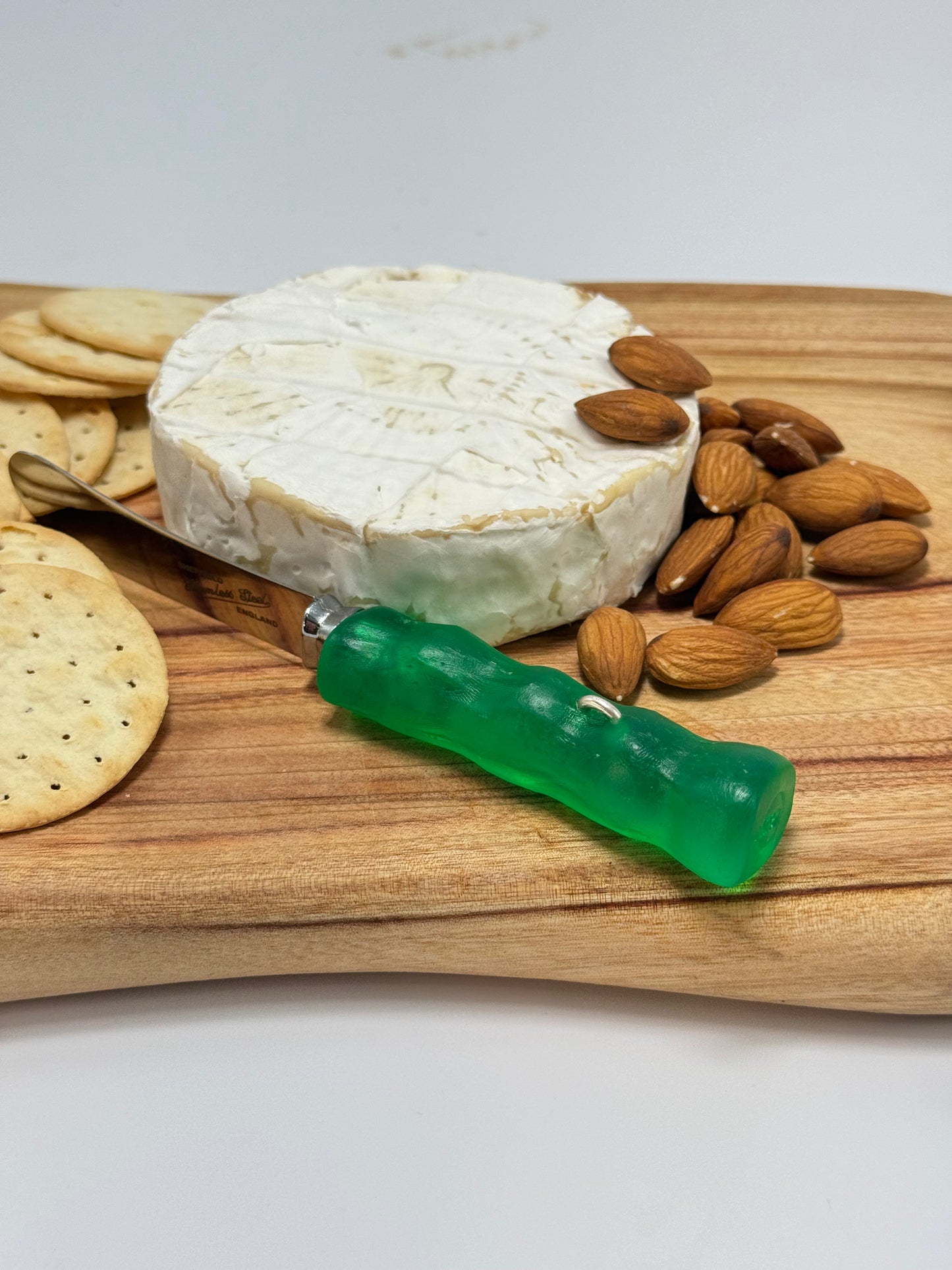 Cheese knife - Jade Green resin - irregular shaped handle with silver staple insert