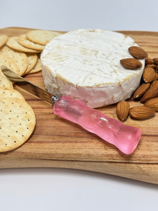 Cheese knife - Pale pink resin - irregular shaped handle with silver staple insert