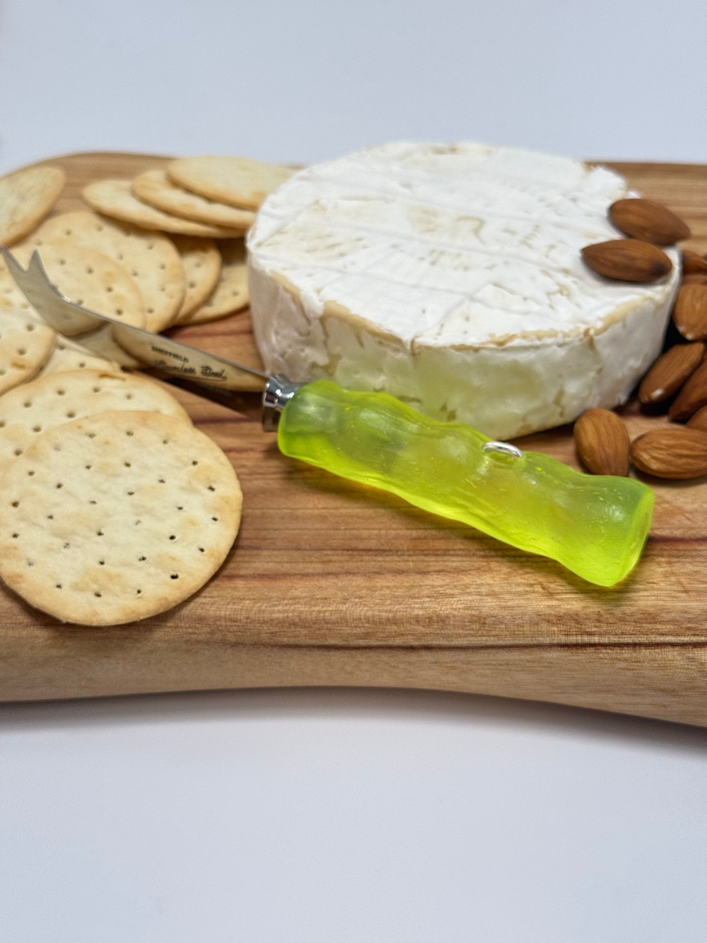 Cheese knife - Neon Yellow resin - irregular shaped handle with silver staple insert