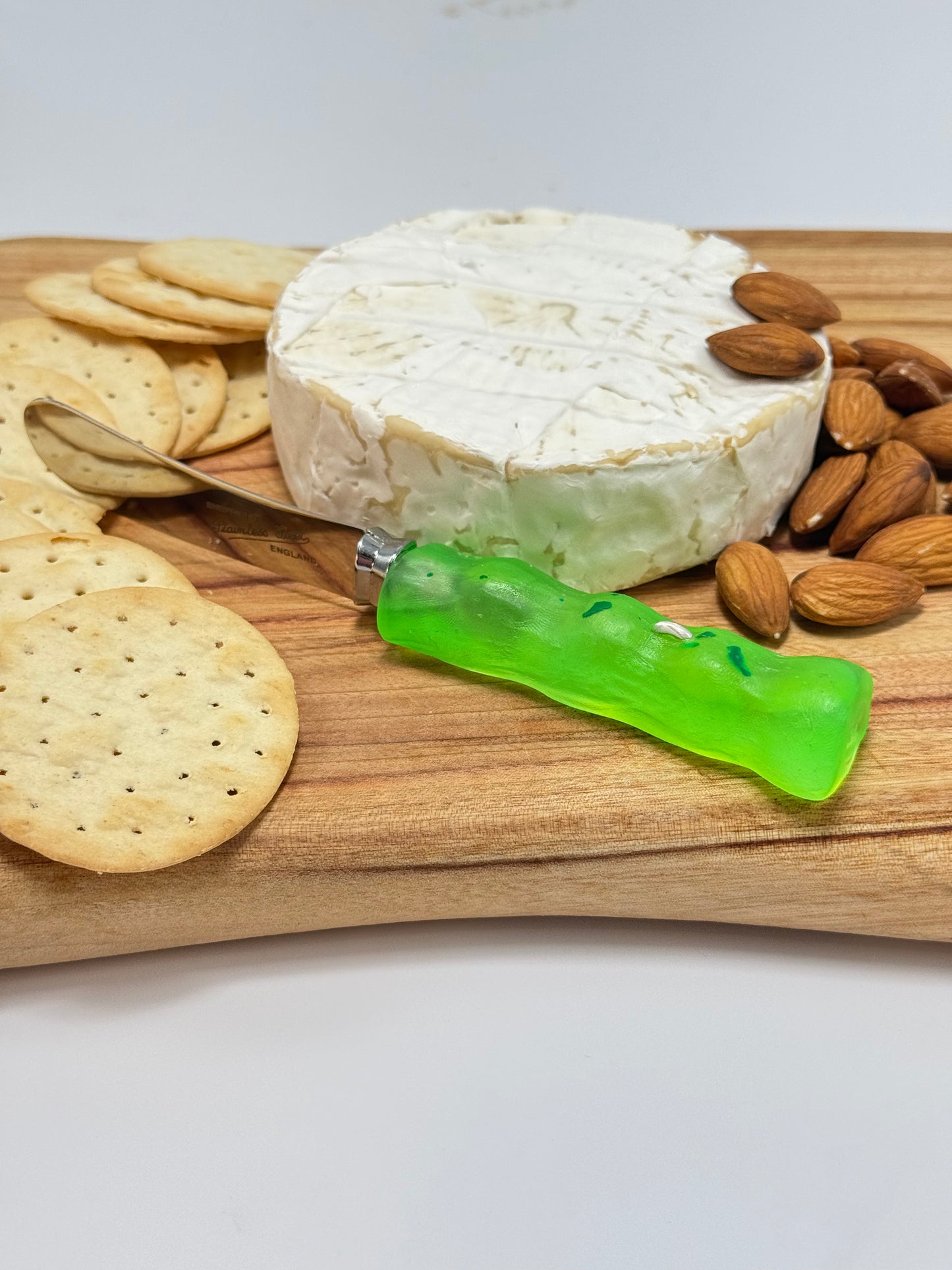 Cheese knife - Neon Green resin - irregular shaped handle with silver staple insert