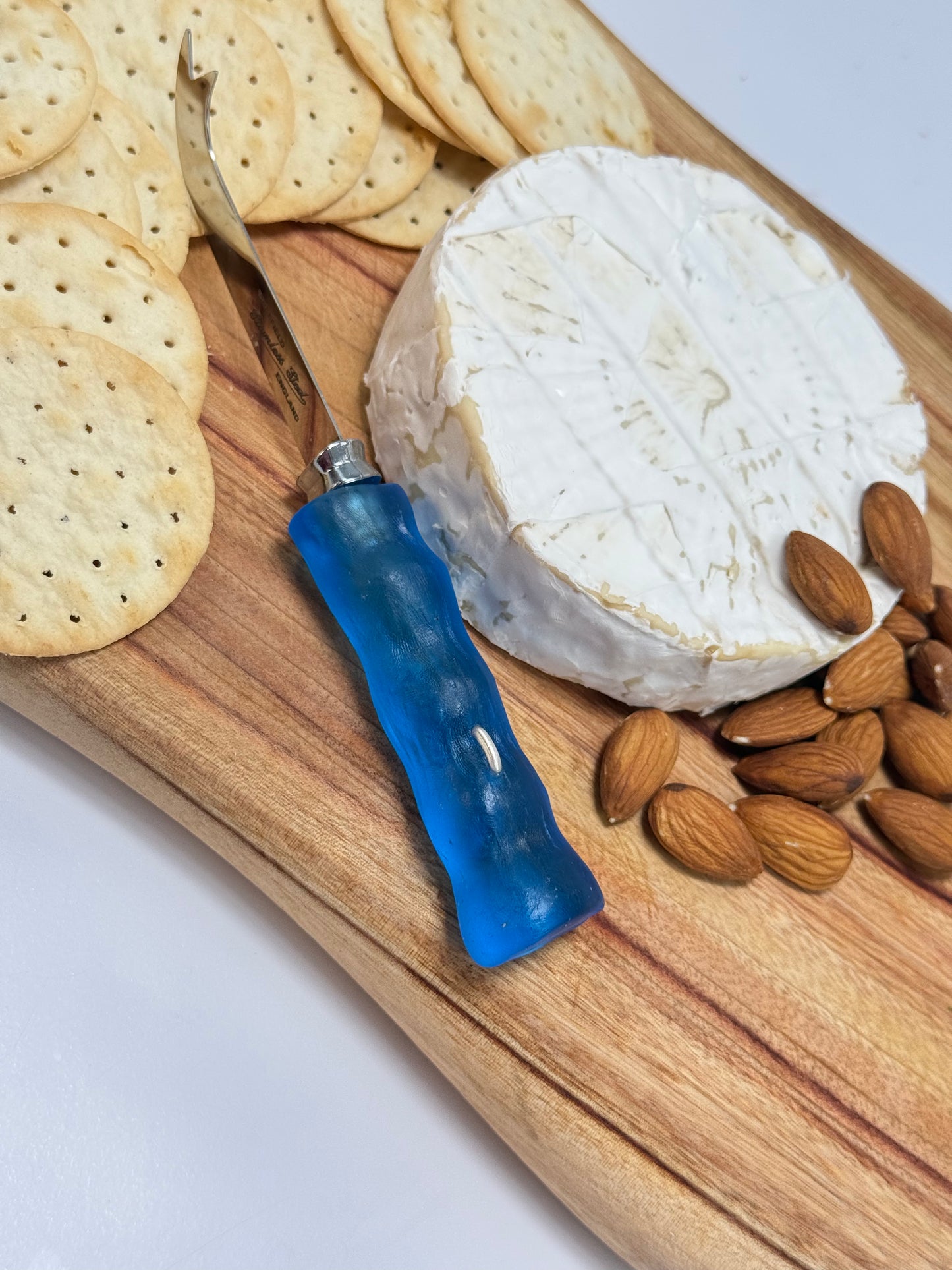 Cheese knife - Blueberry blue resin - irregular shaped handle with silver staple insert