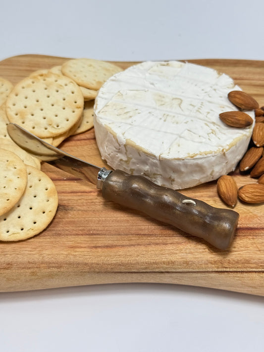 Cheese knife - Brown/bronze resin - irregular shaped handle with silver staple insert