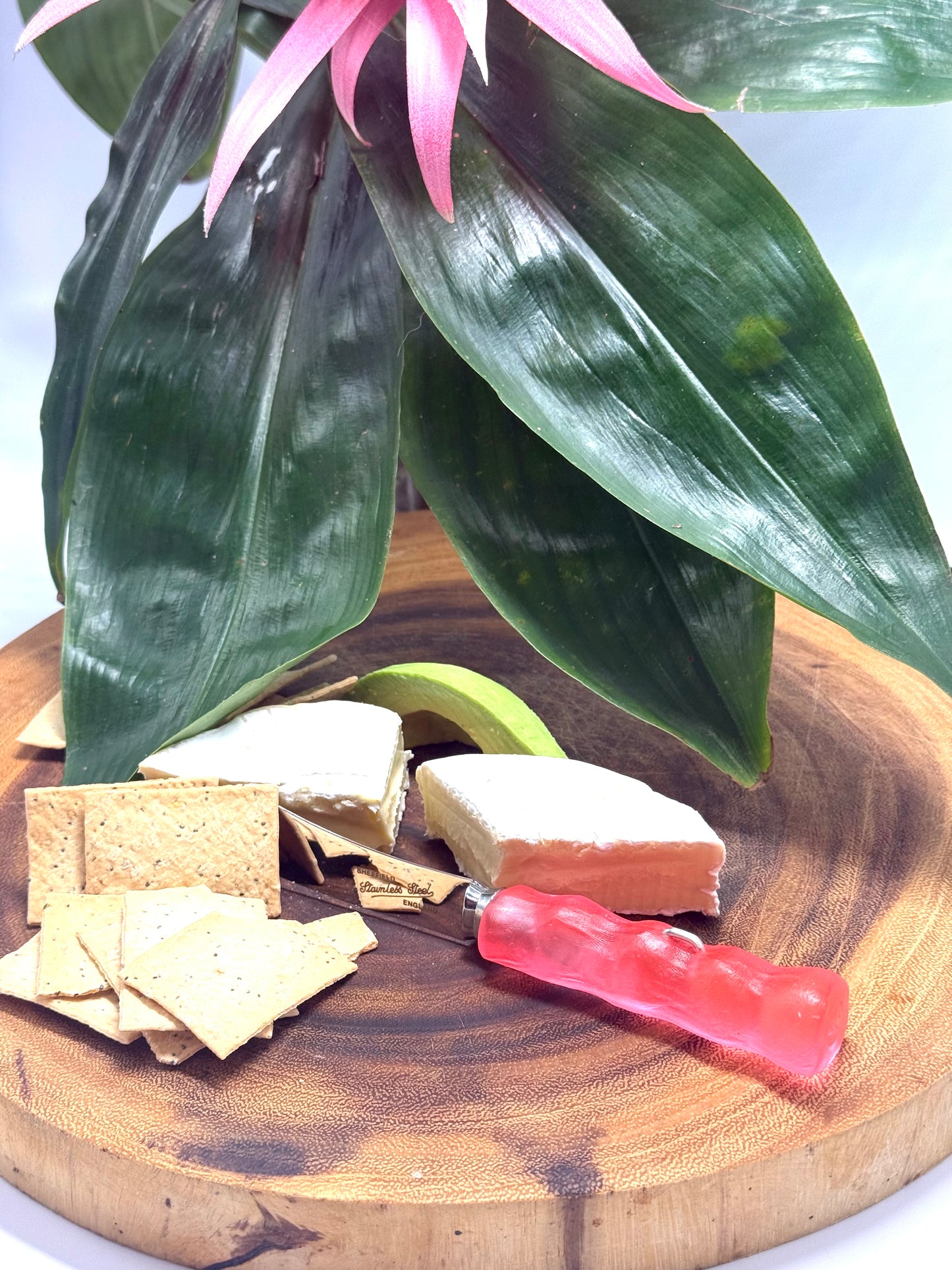 Cheese knife - Neon Red resin - irregular shaped handle with silver staple insert