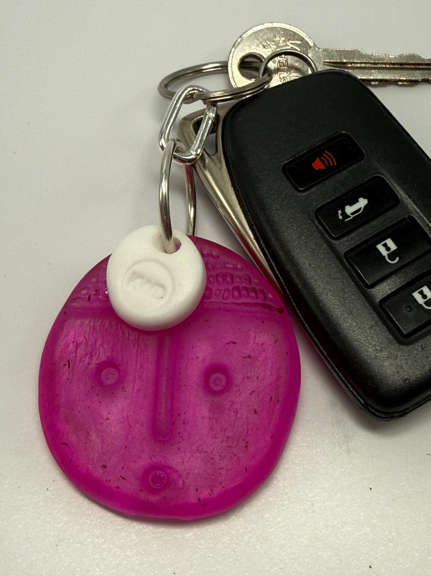 Key Chain - Pink Face /KWD stamp resin beads with silver finishes