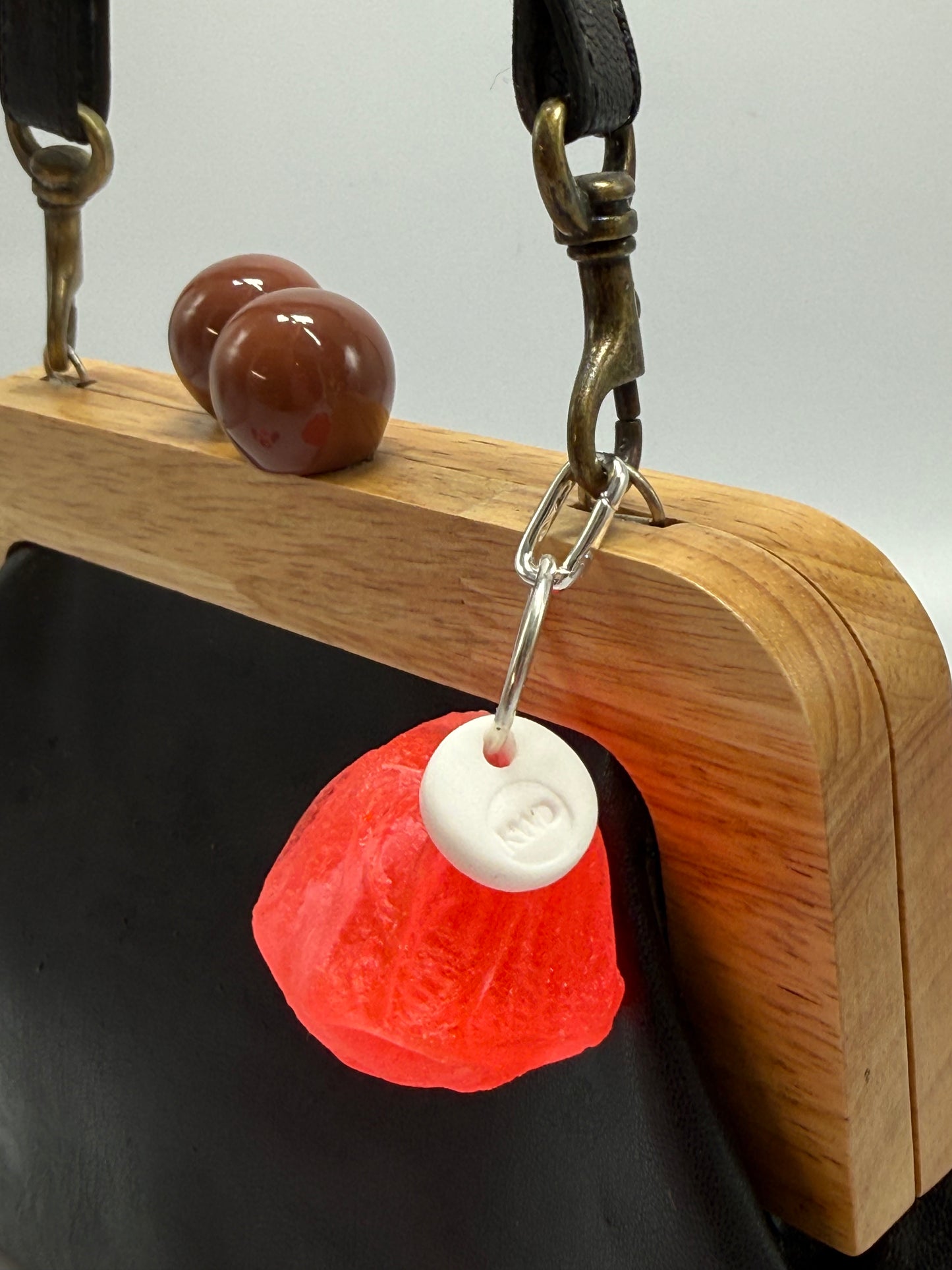 Key Chain - Neon Red Organic Nut /KWD stamp resin beads with silver finishes