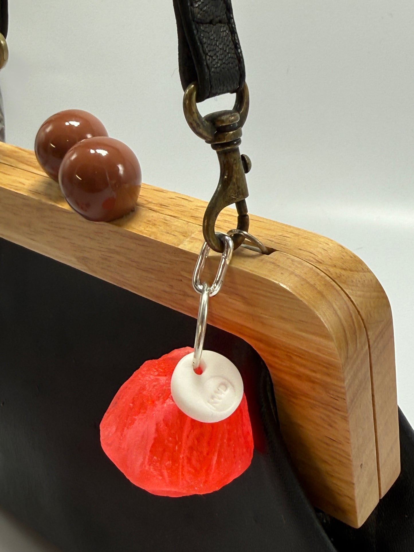 Key Chain - Neon Red Organic Nut /KWD stamp resin beads with silver finishes