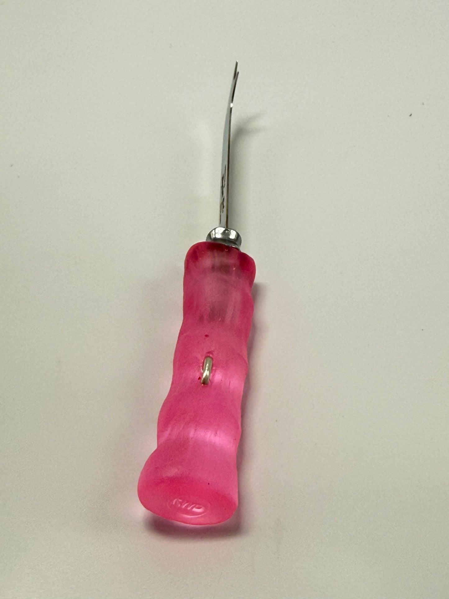 Cheese knife - Translucent Pink resin - irregular shaped handle with silver staple insert
