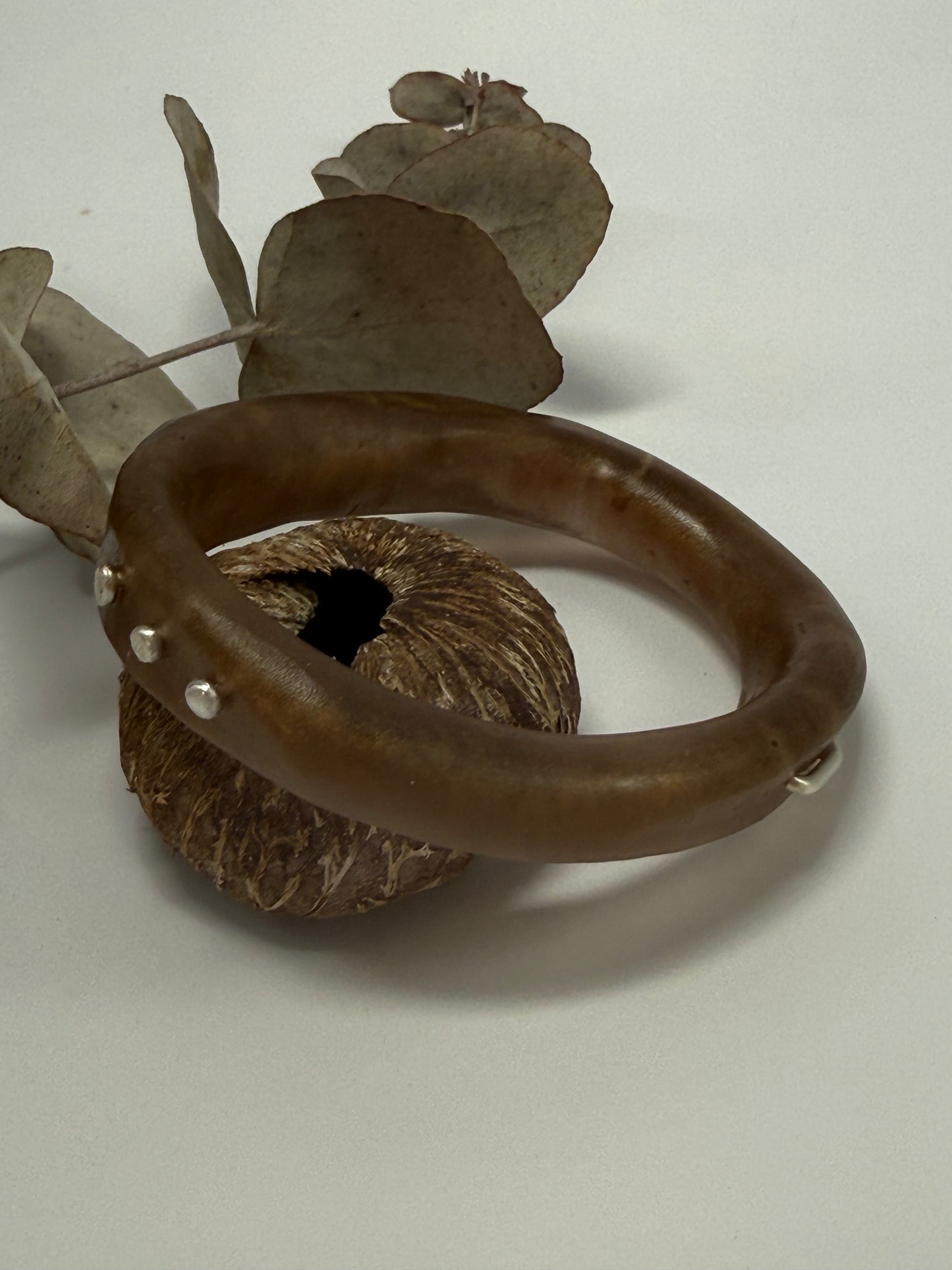 Brown resin and silver 'woopy' bangle - regular size