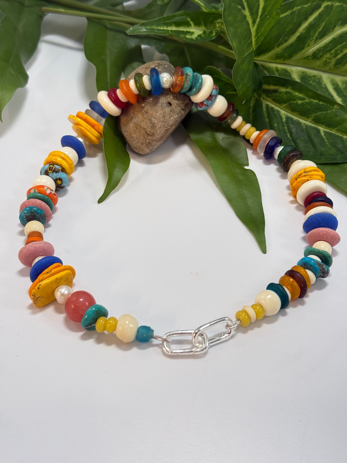 Multi coloured semi precious beads with silver catches with removable fish pendant