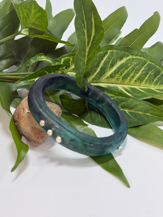 Translucent Green/black coloured resin rim bangle with sterling silver rivets