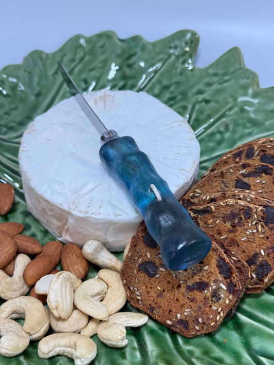 Cheese knife - Translucent blue/green resin - irregular shaped handle with silver staple insert