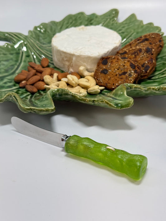 Cheese knife - Lime green with white specs resin - irregular shaped handle with silver staple insert