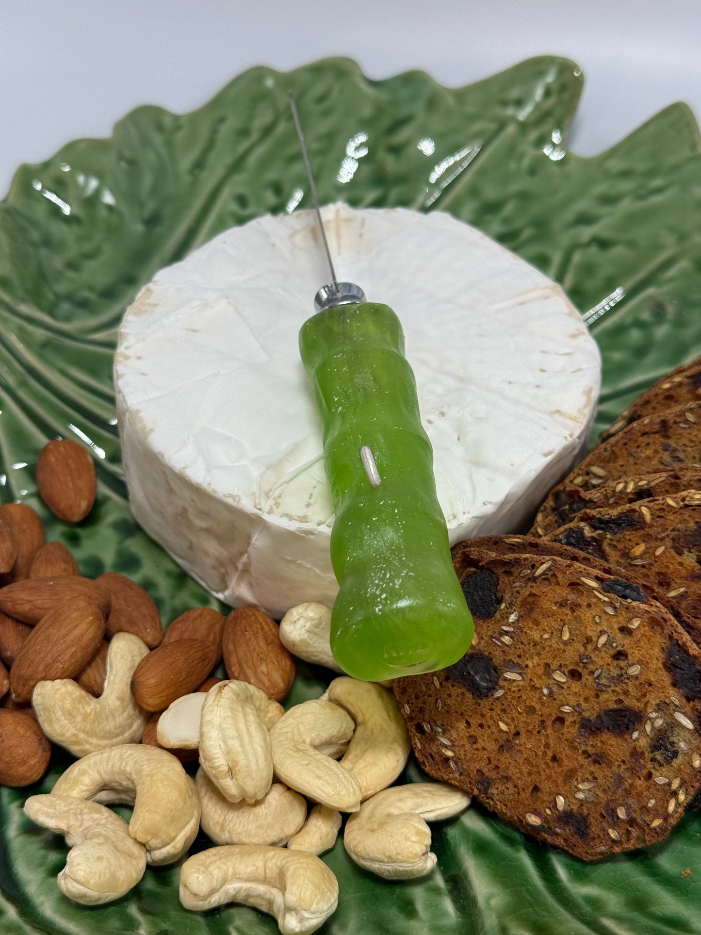 Cheese knife - Lime green with white specs resin - irregular shaped handle with silver staple insert