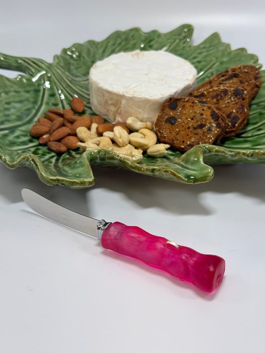 Cheese knife - Translucent Pink/red with white specs resin - irregular shaped handle with silver staple insert