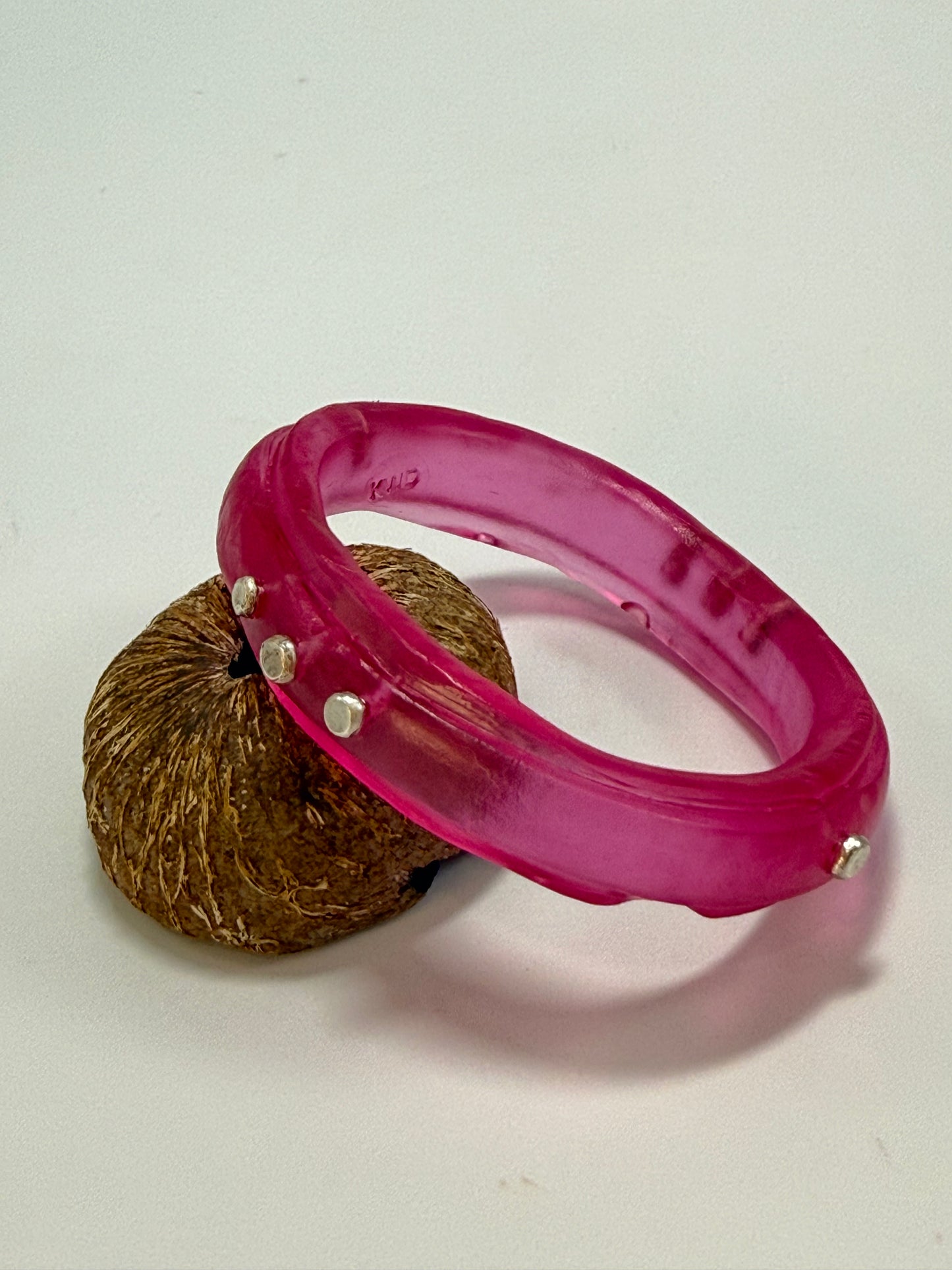 Translucent Strawberry Red resin rim bangle with sterling silver rivets