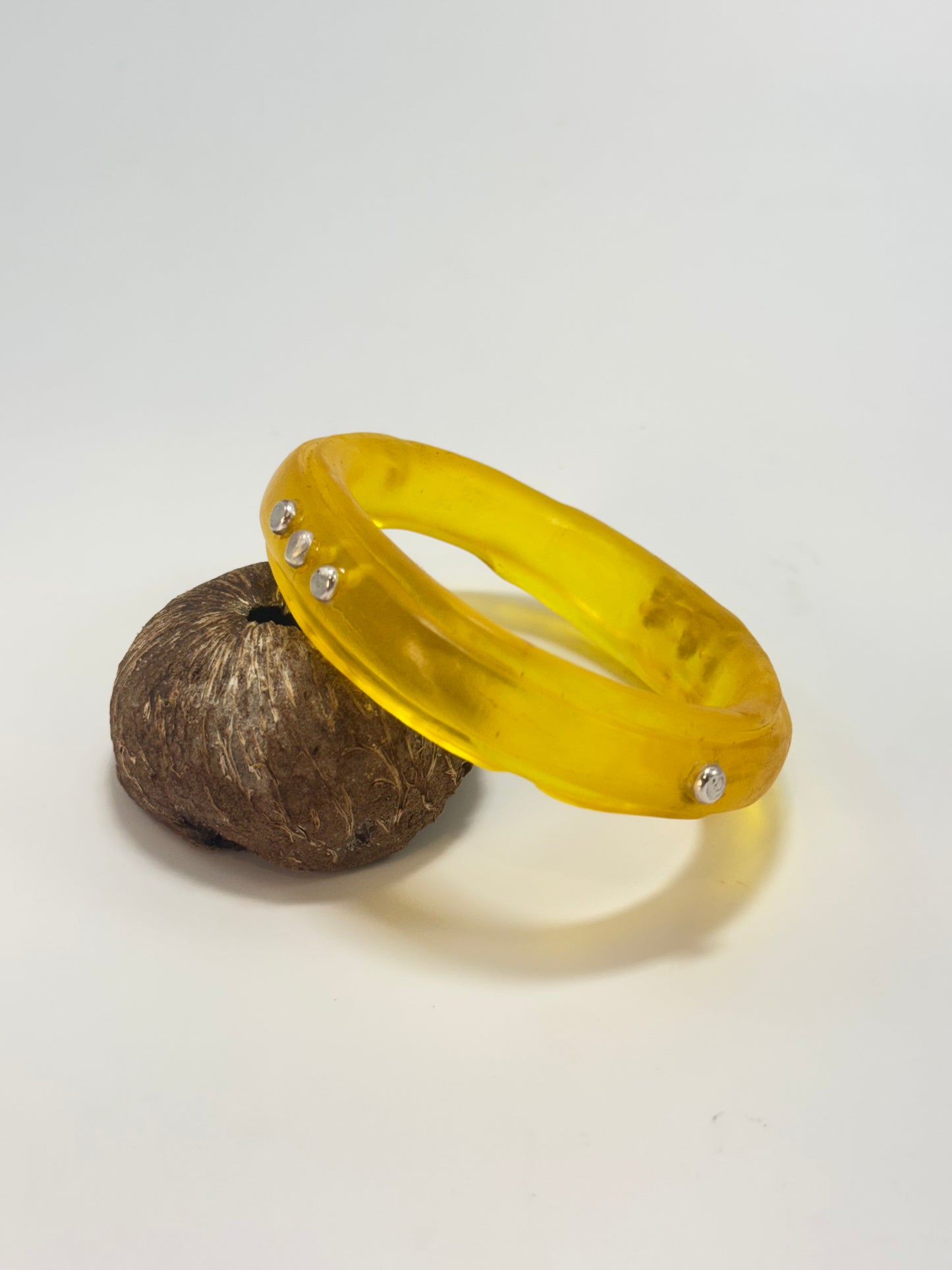 Translucent Yellow resin rim bangle with sterling silver rivets