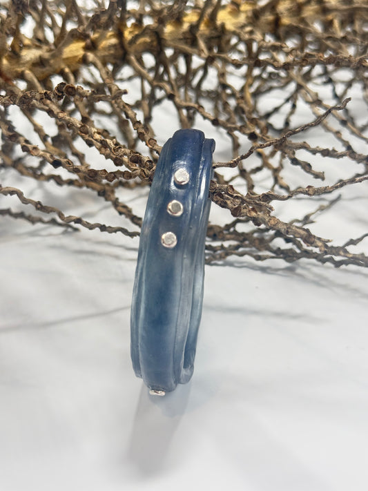 Translucent Navy Blue resin rim bangle with sterling silver rivets