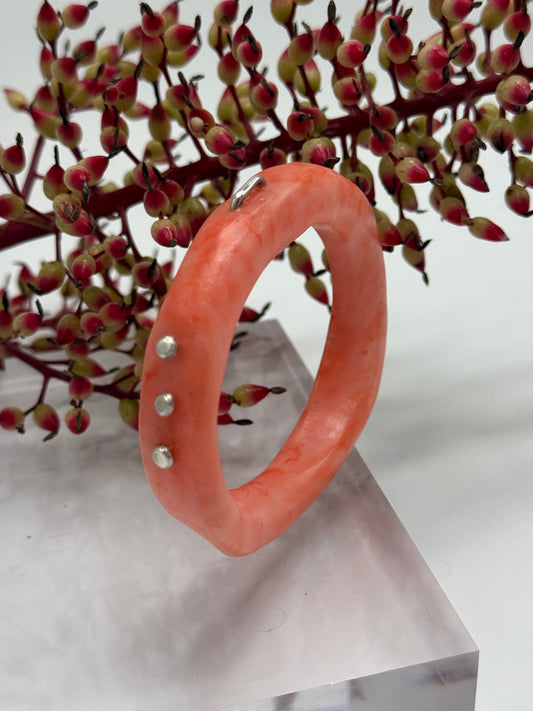 Orange/apricot swirl resin with silver rivets 'woopy' bangle