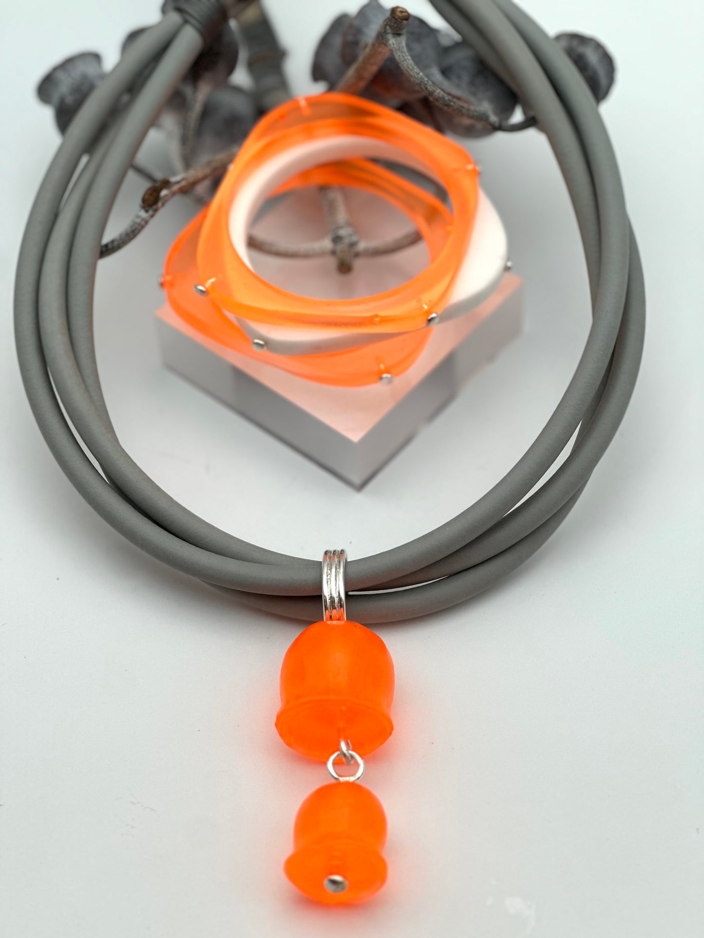 Triple Rubber Choker with Neon Orange & Silver Gum nut pendant