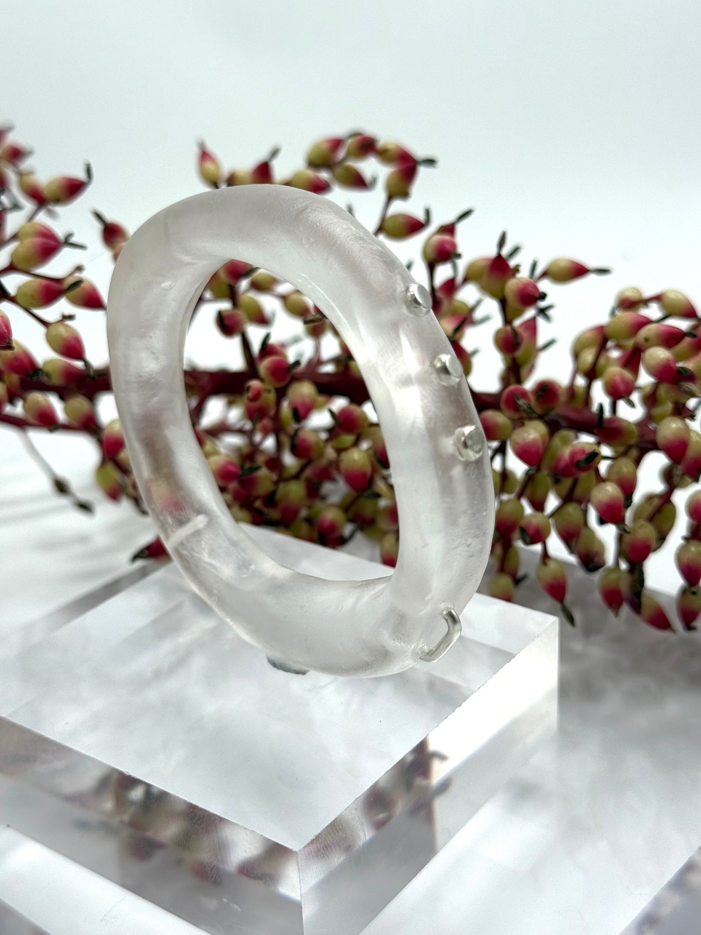 Clear resin with silver rivets 'woopy' bangle
