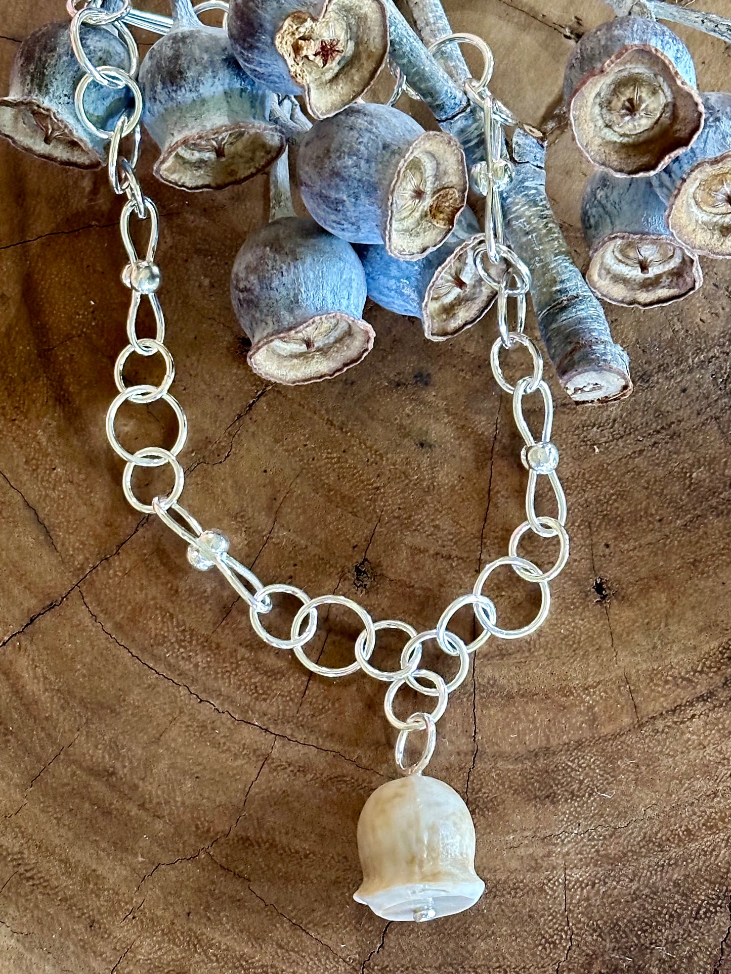 Sterling silver chain with cream gumnut pendant
