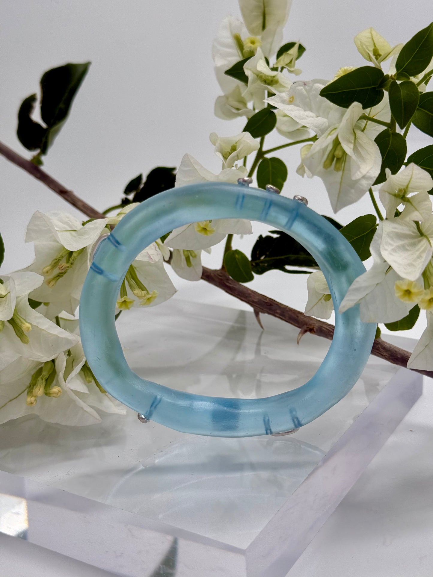 Translucent blue resin & silver woopy bangle - XL