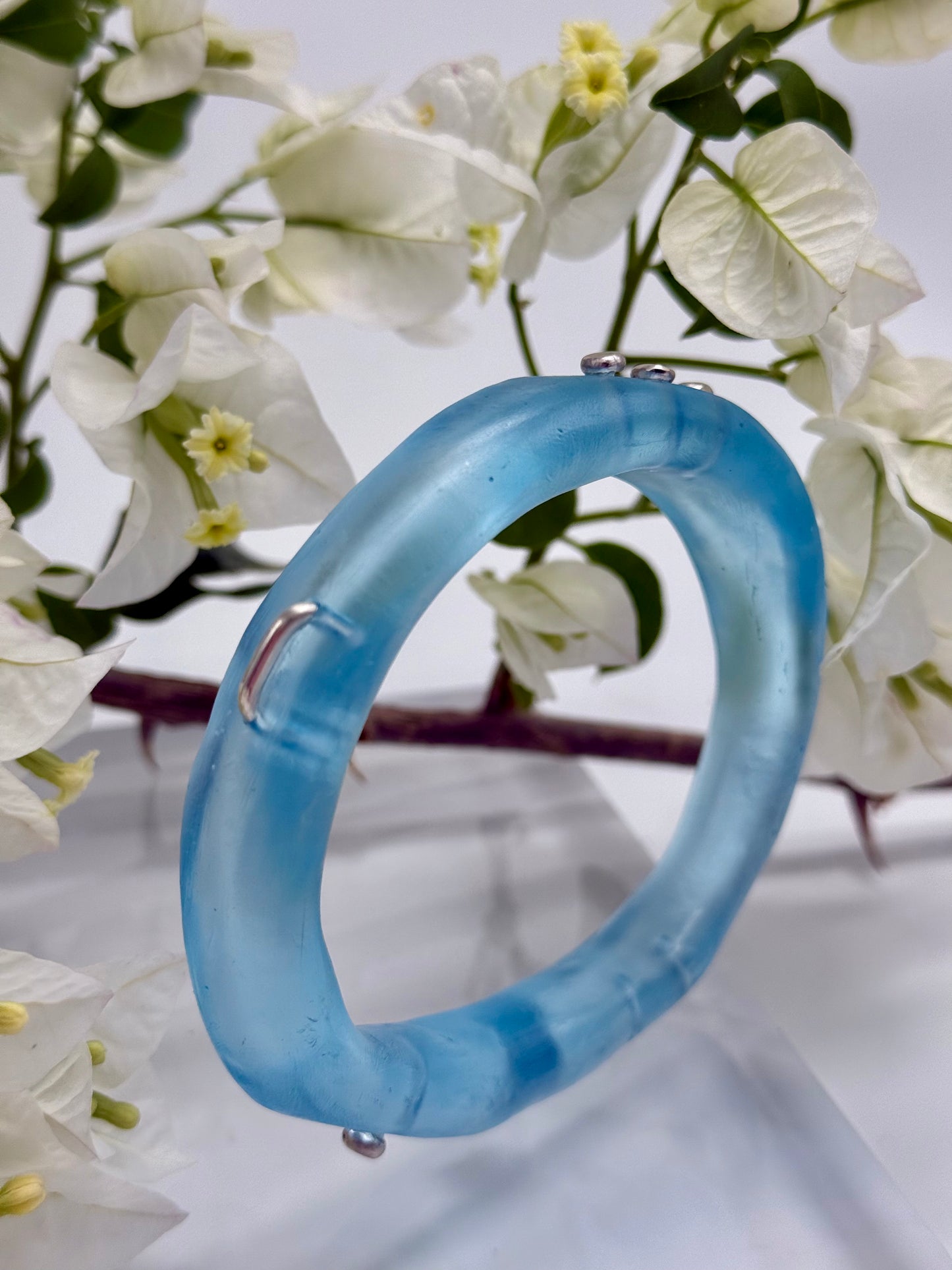 Translucent blue resin & silver woopy bangle - XL