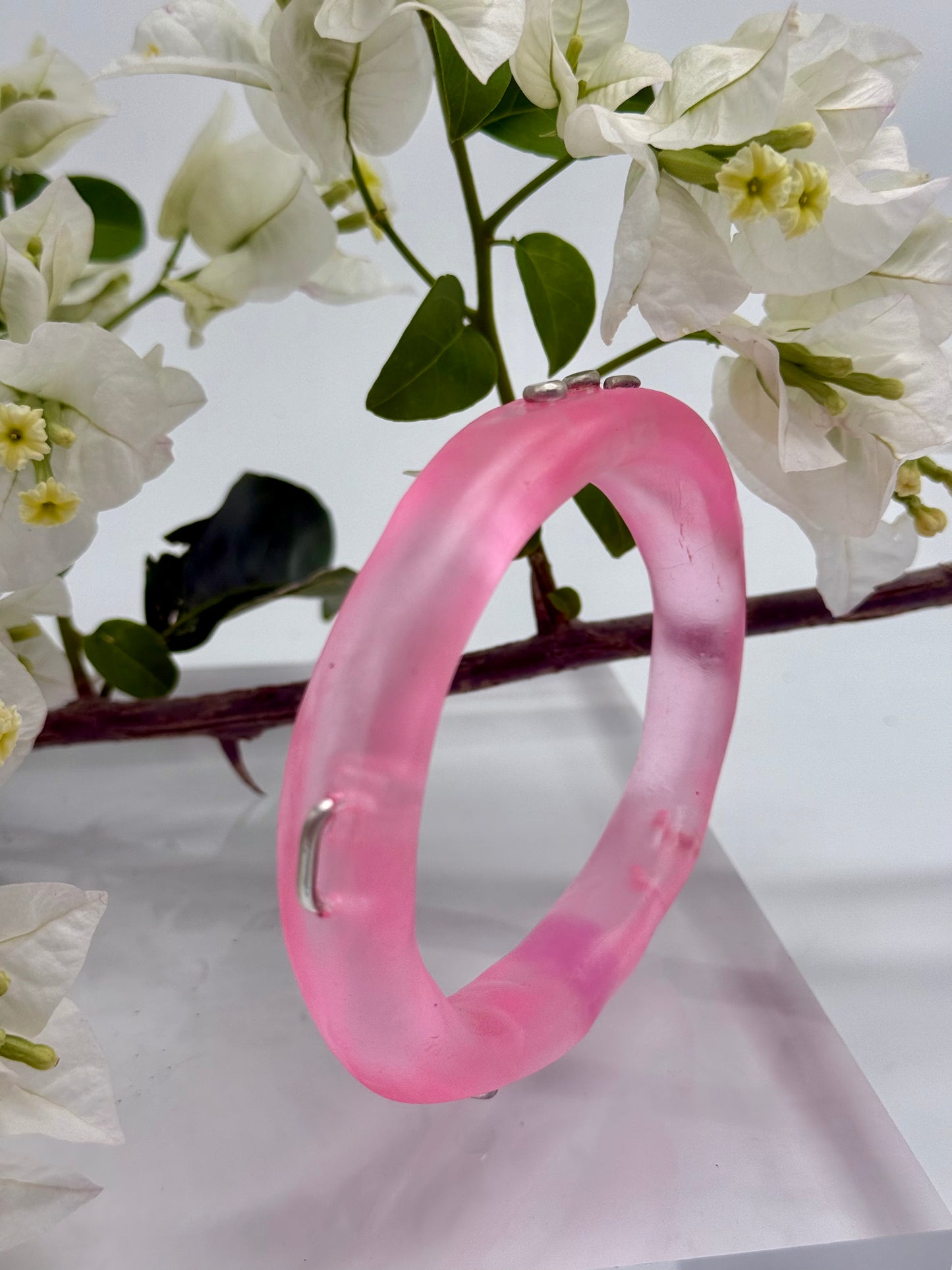 Translucent pink resin & silver woopy bangle - XL