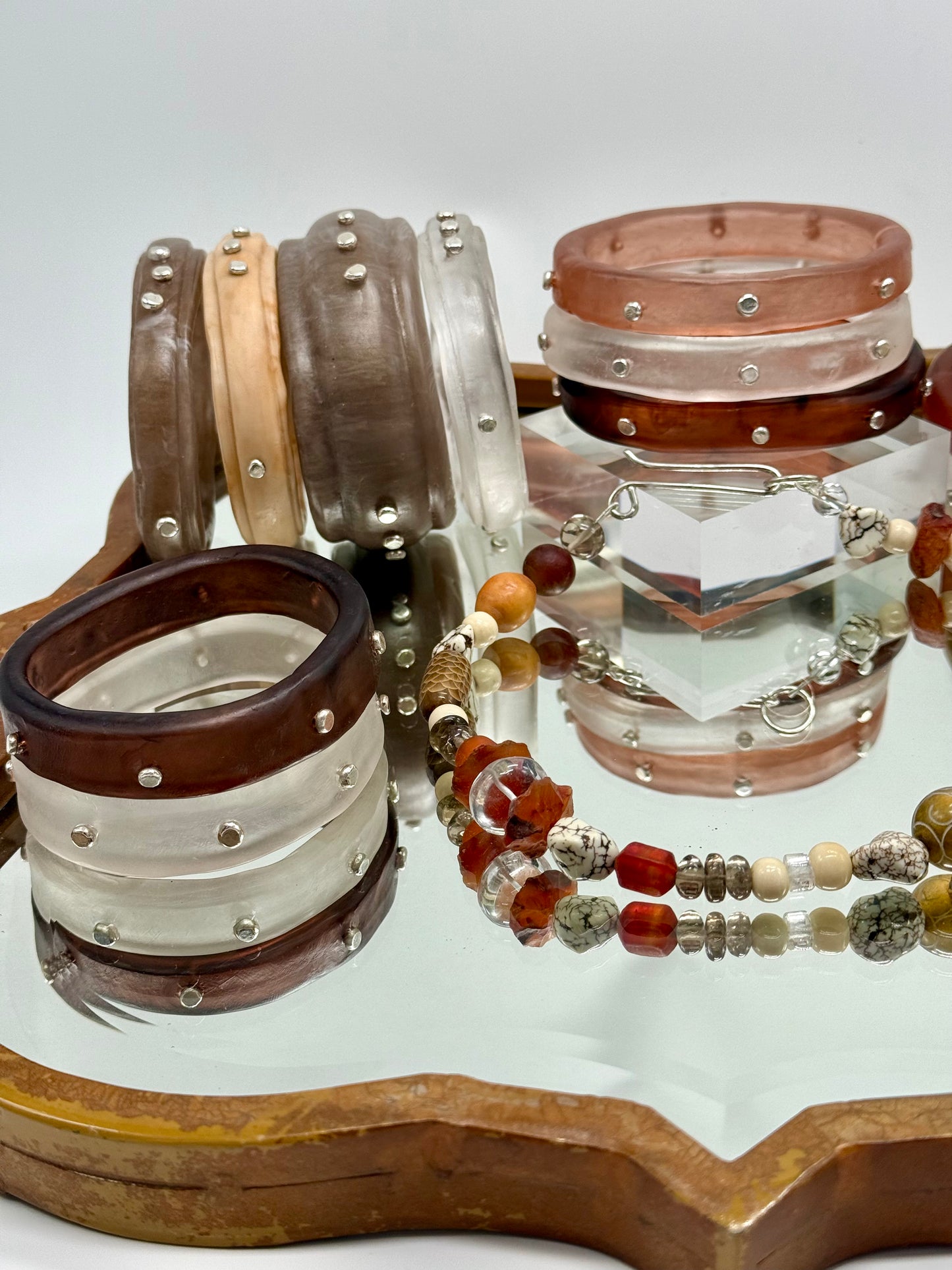 Neutral/brown coloured semi precious stones with Sterling silver catch