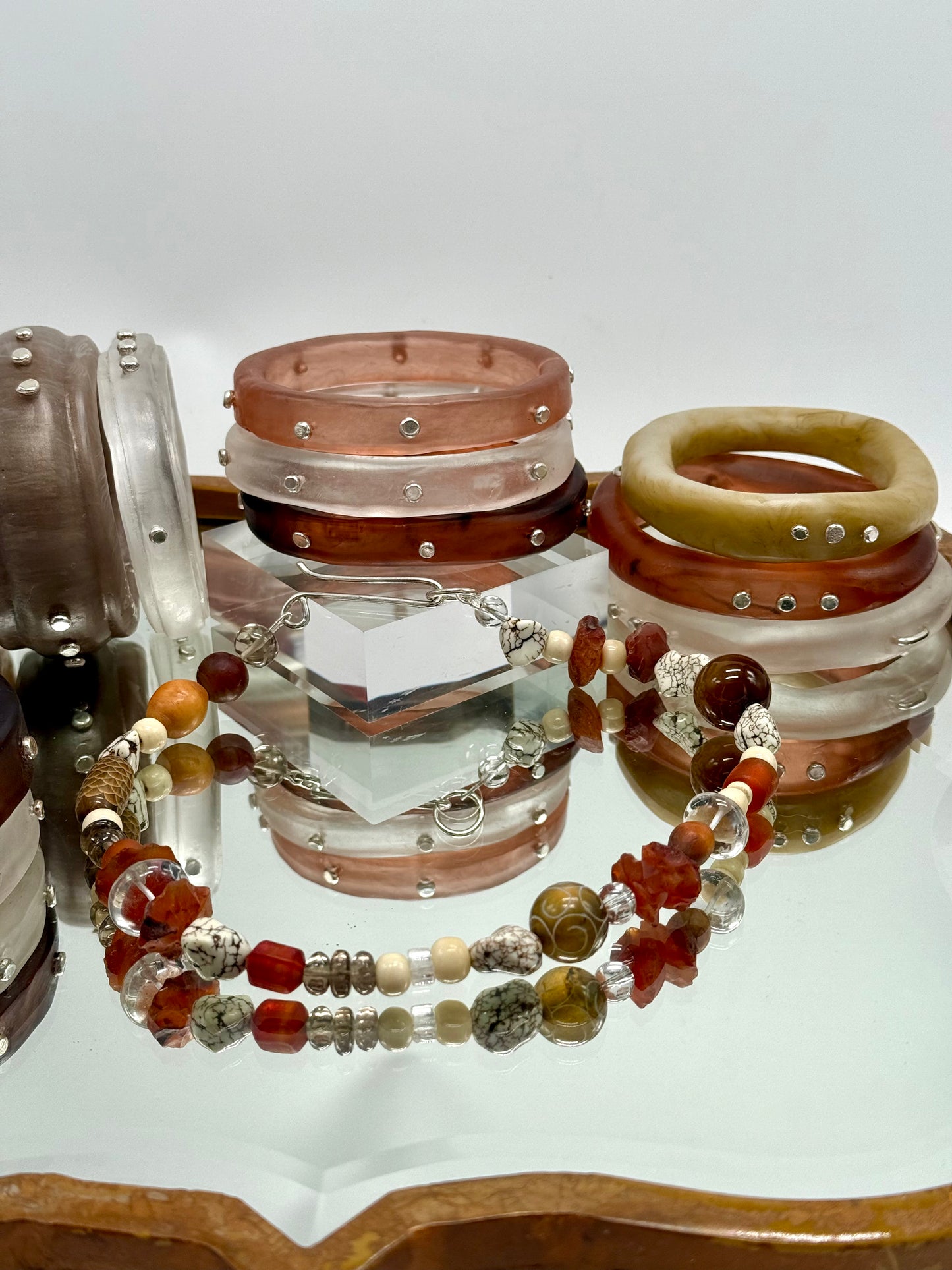 Neutral/brown coloured semi precious stones with Sterling silver catch
