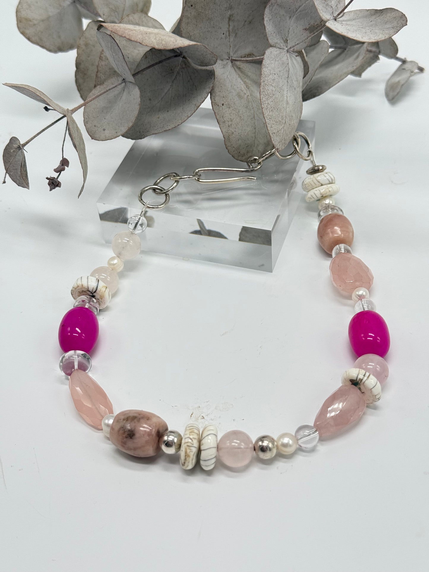 Pink coloured semi precious stone with Sterling silver catch