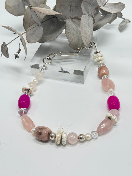 Pink coloured semi precious stone with Sterling silver catch