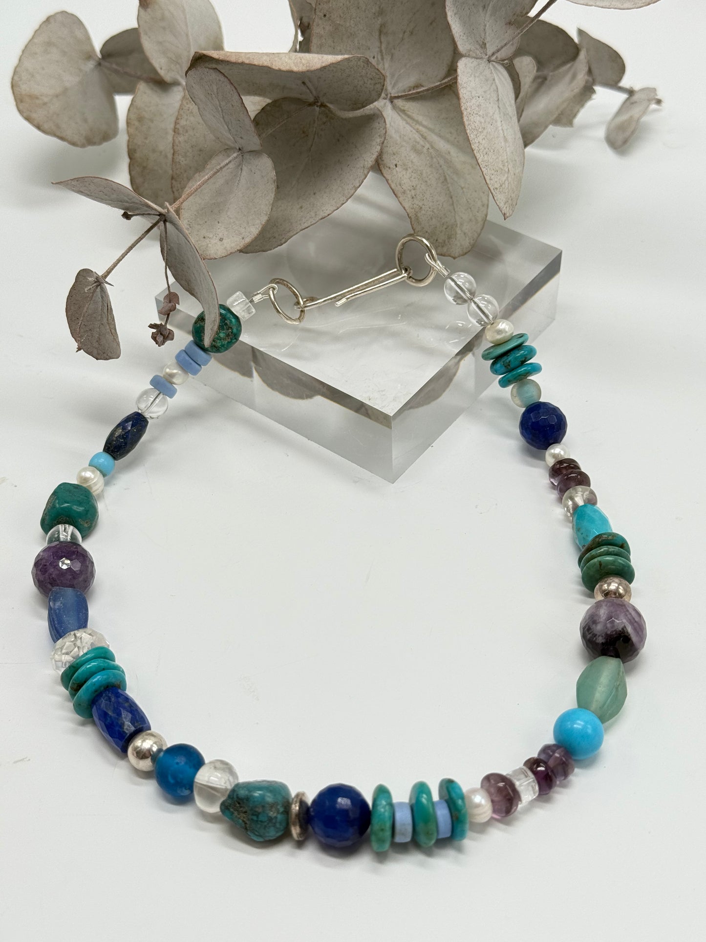 Blues/purple coloured semi precious stone with Sterling silver catch