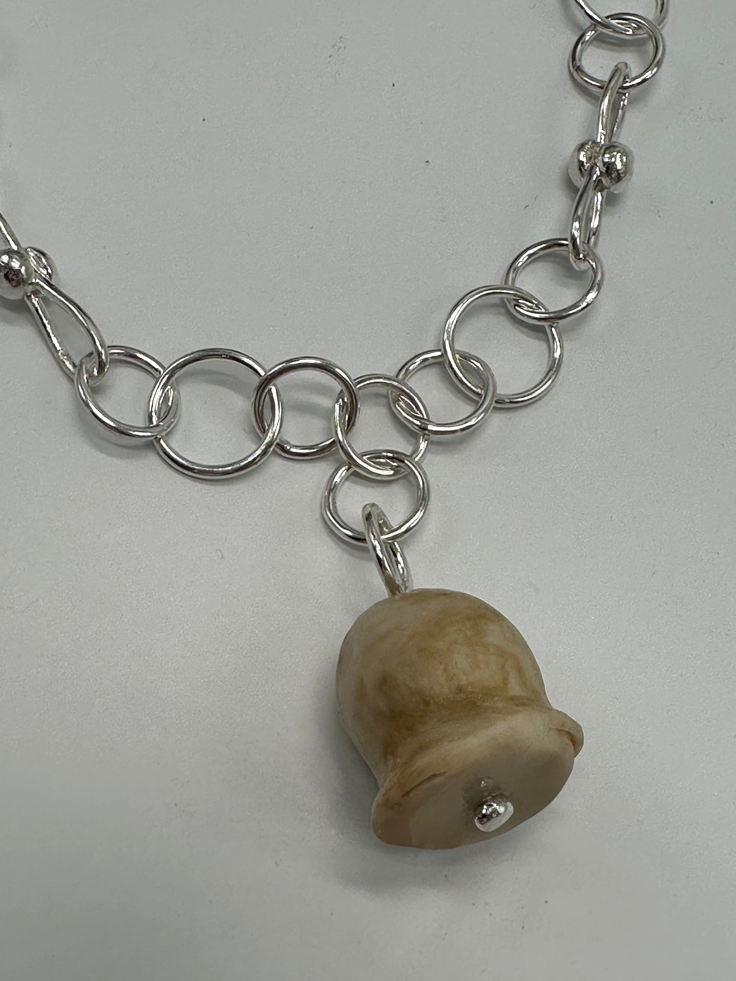 Sterling silver chain with cream gumnut pendant